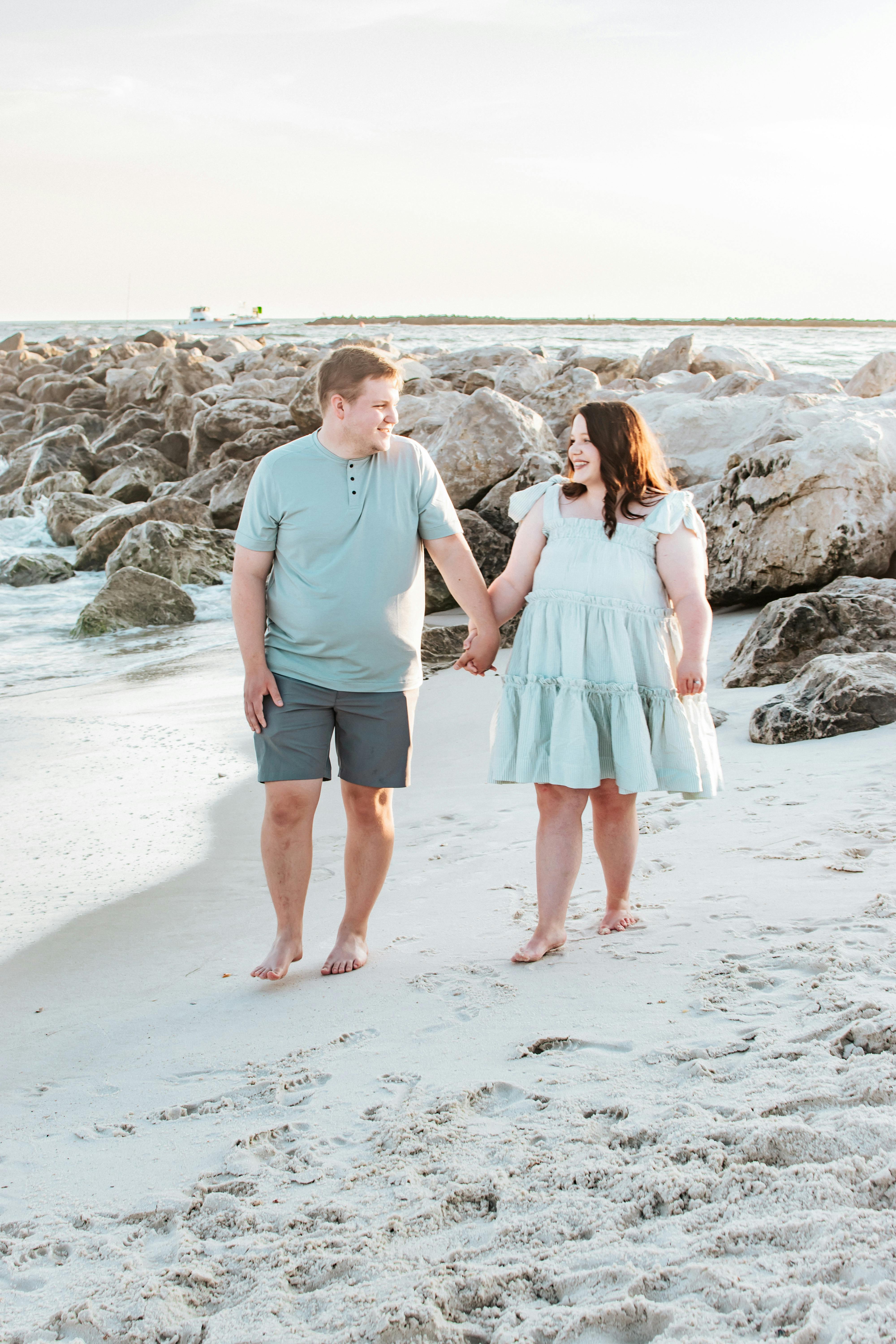 Couple Walking on Sandy Beach