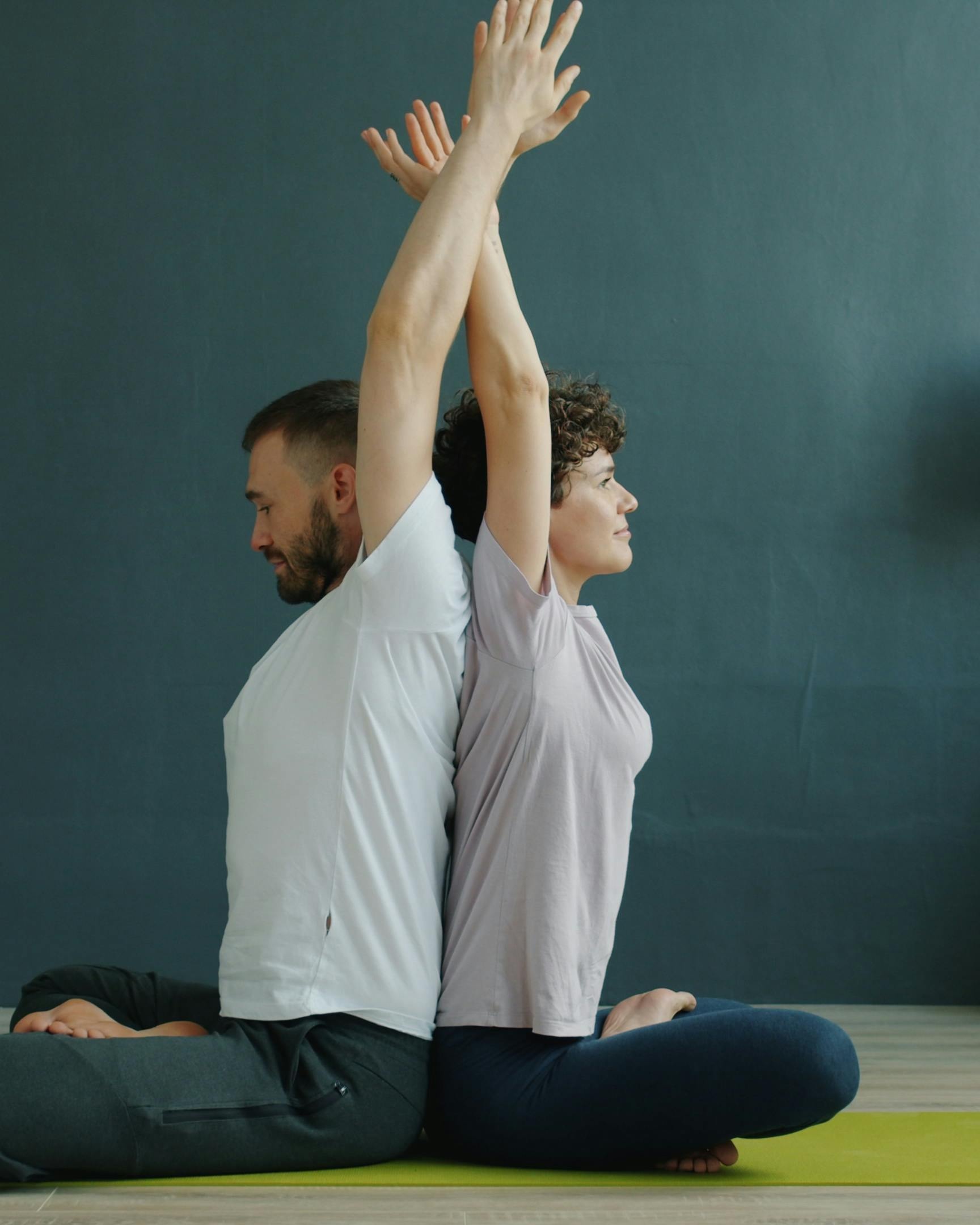 Two People Doing Partner Yoga