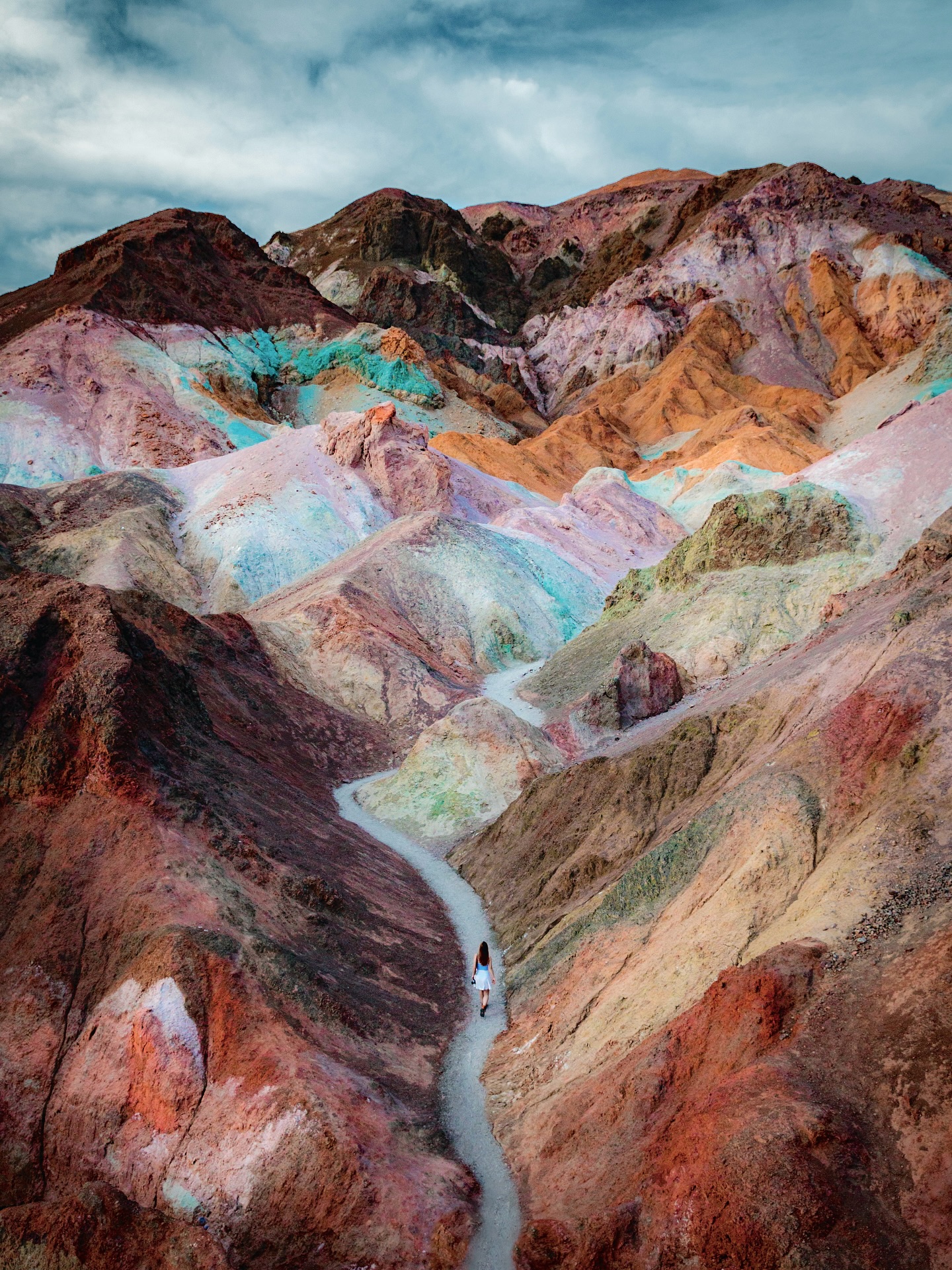 Woman Hiking Colorful Mountains