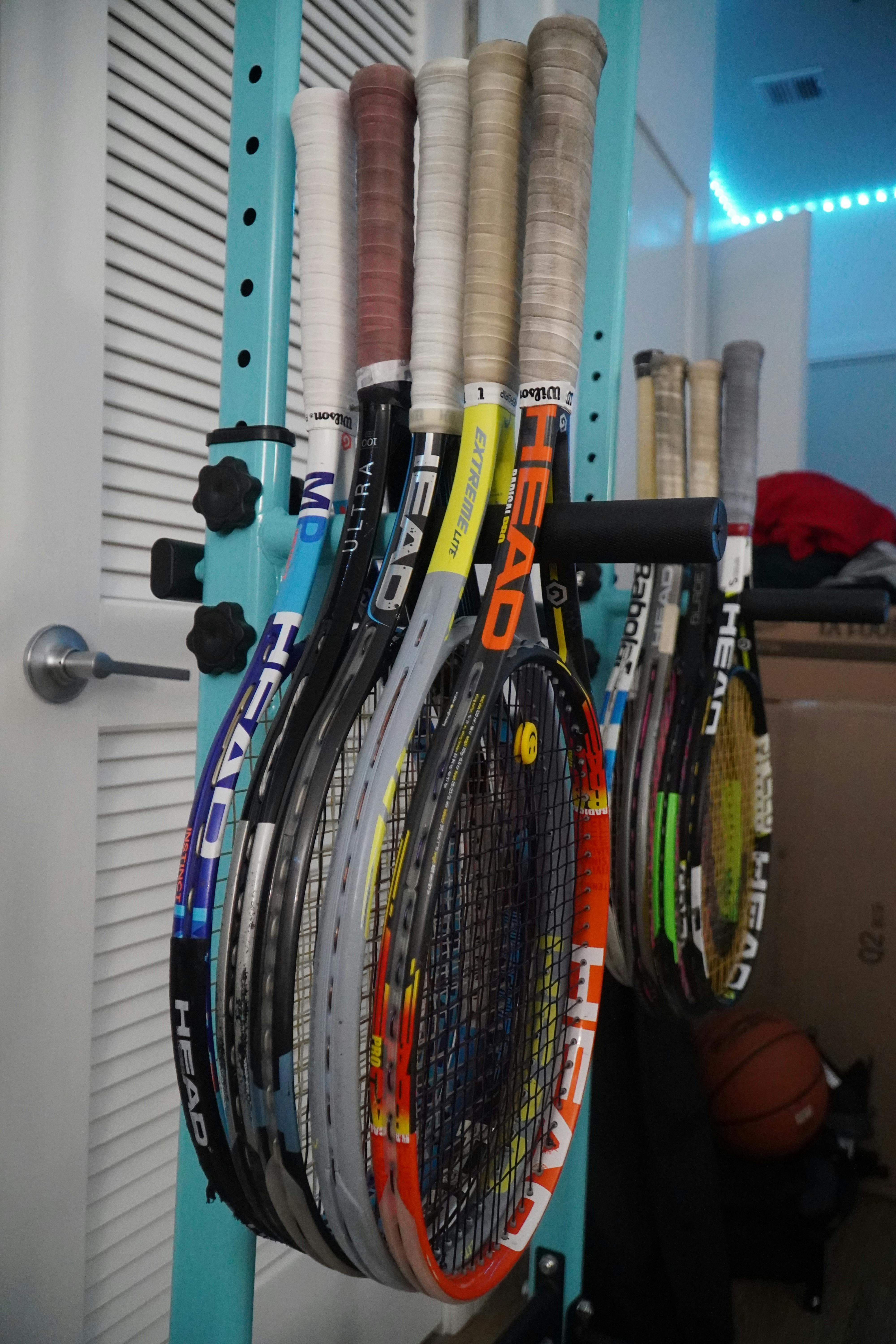 Tennis Rackets on Storage Rack