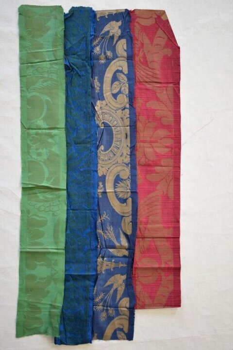 Four Folded Decorative Fabric Strips