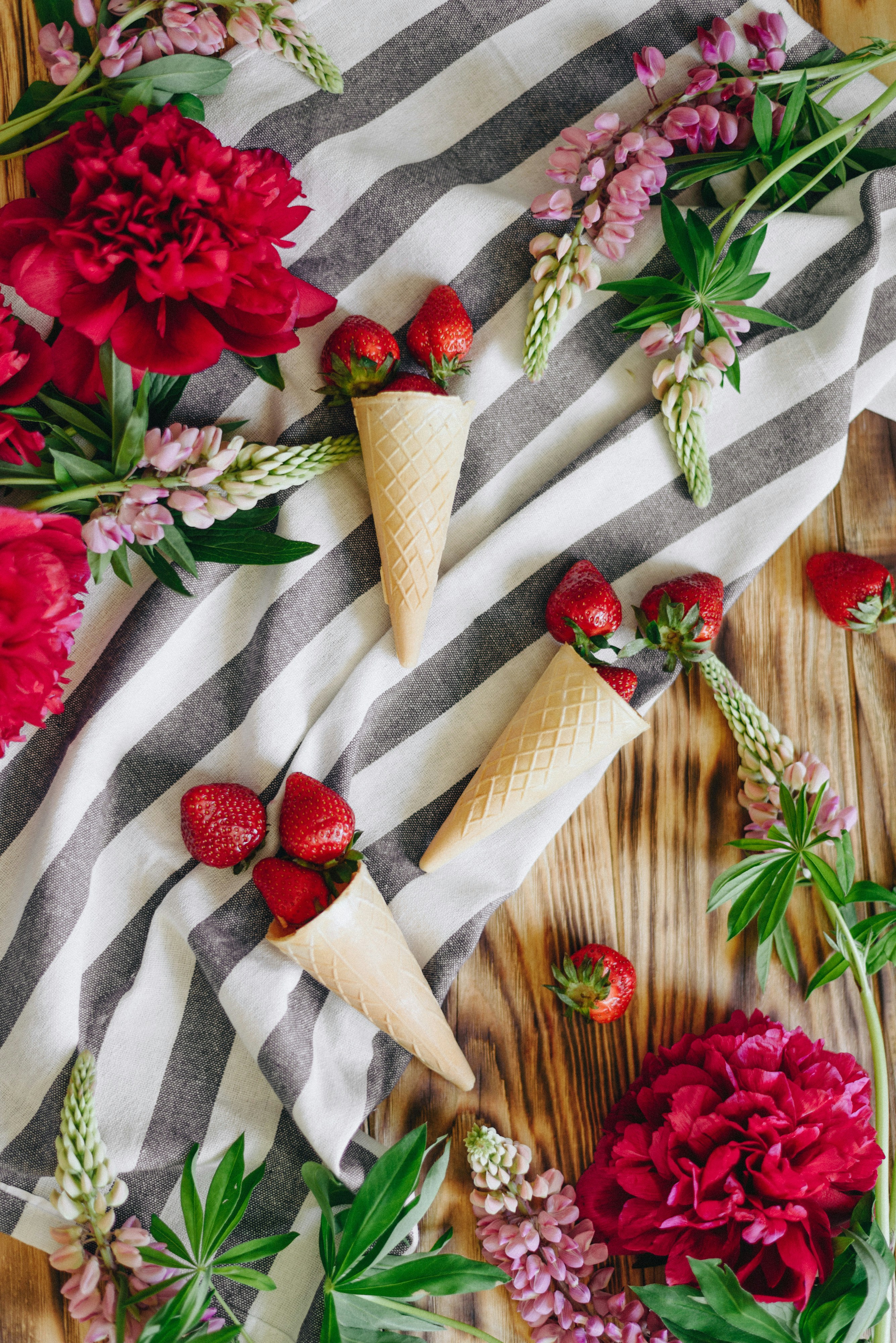 Strawberry Cones with Flowers on Wood