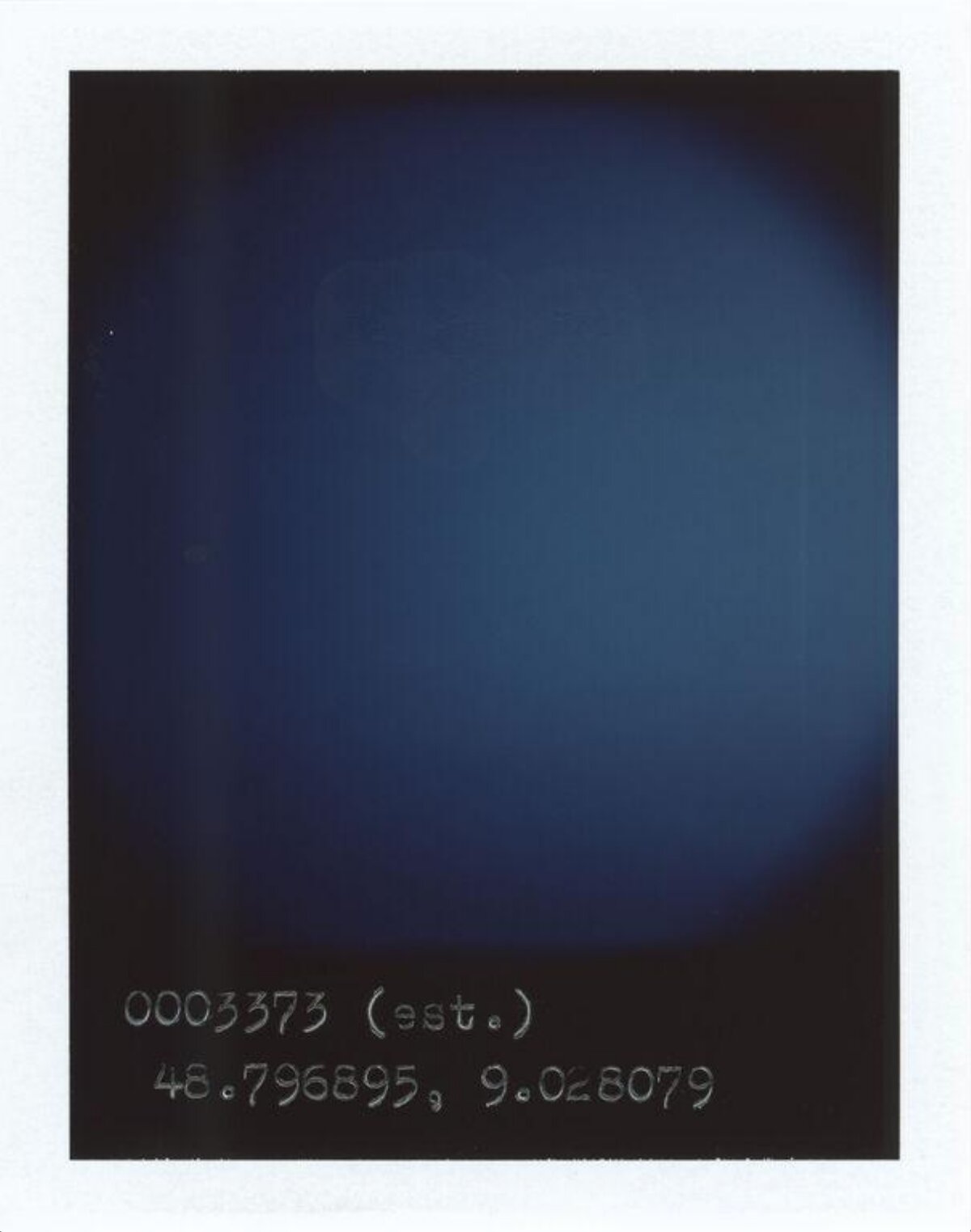 Dark Polaroid With Handwritten Coordinates