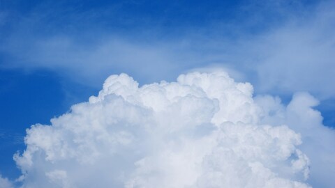 White Cumulus Clouds In Blue Sky