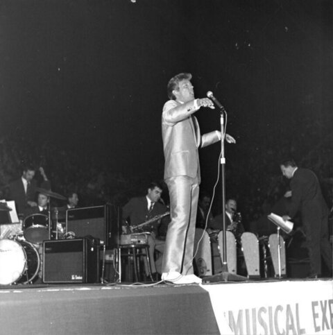 Vintage Singer Performing On Stage