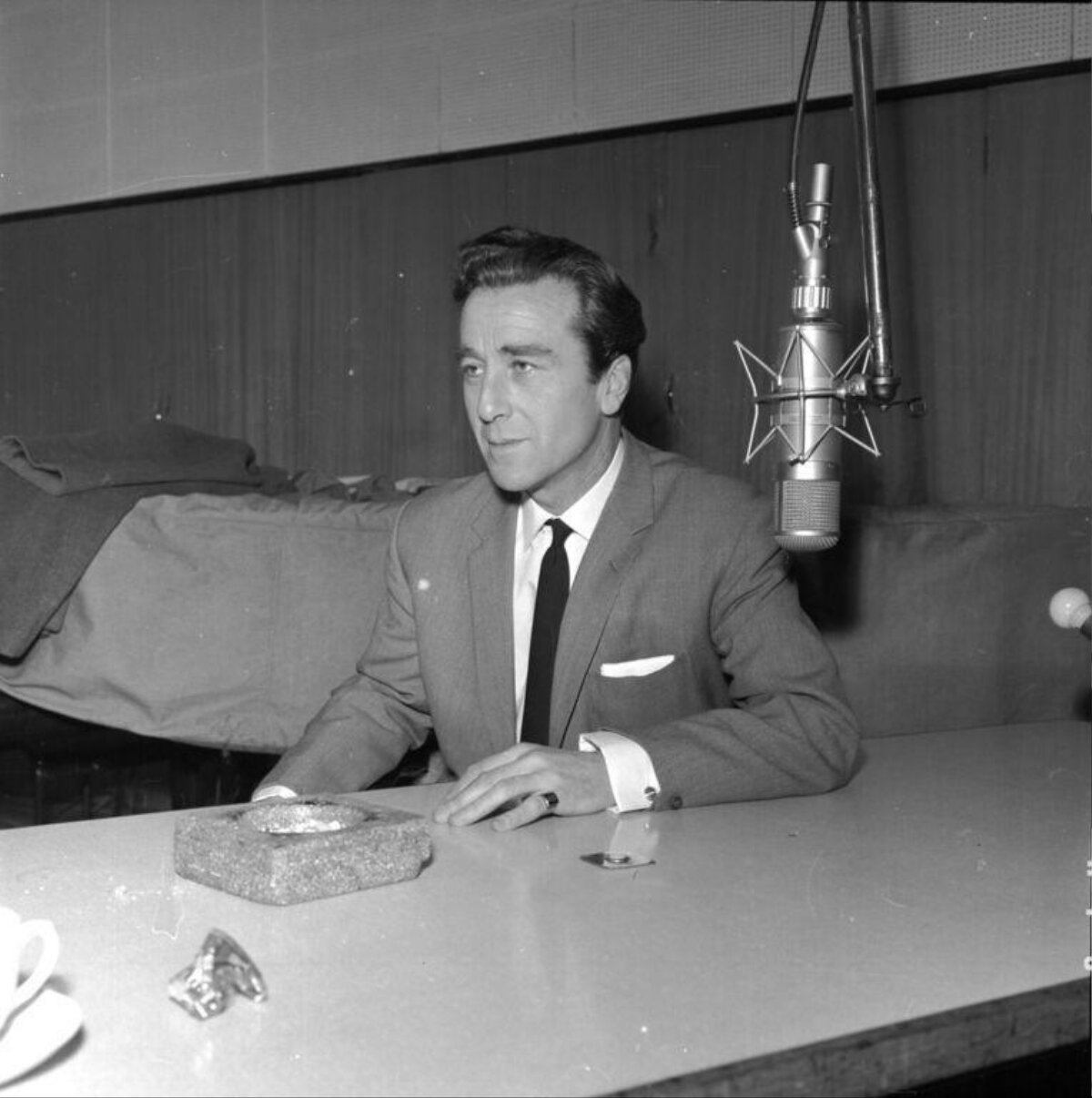 Man at Microphone in Radio Studio