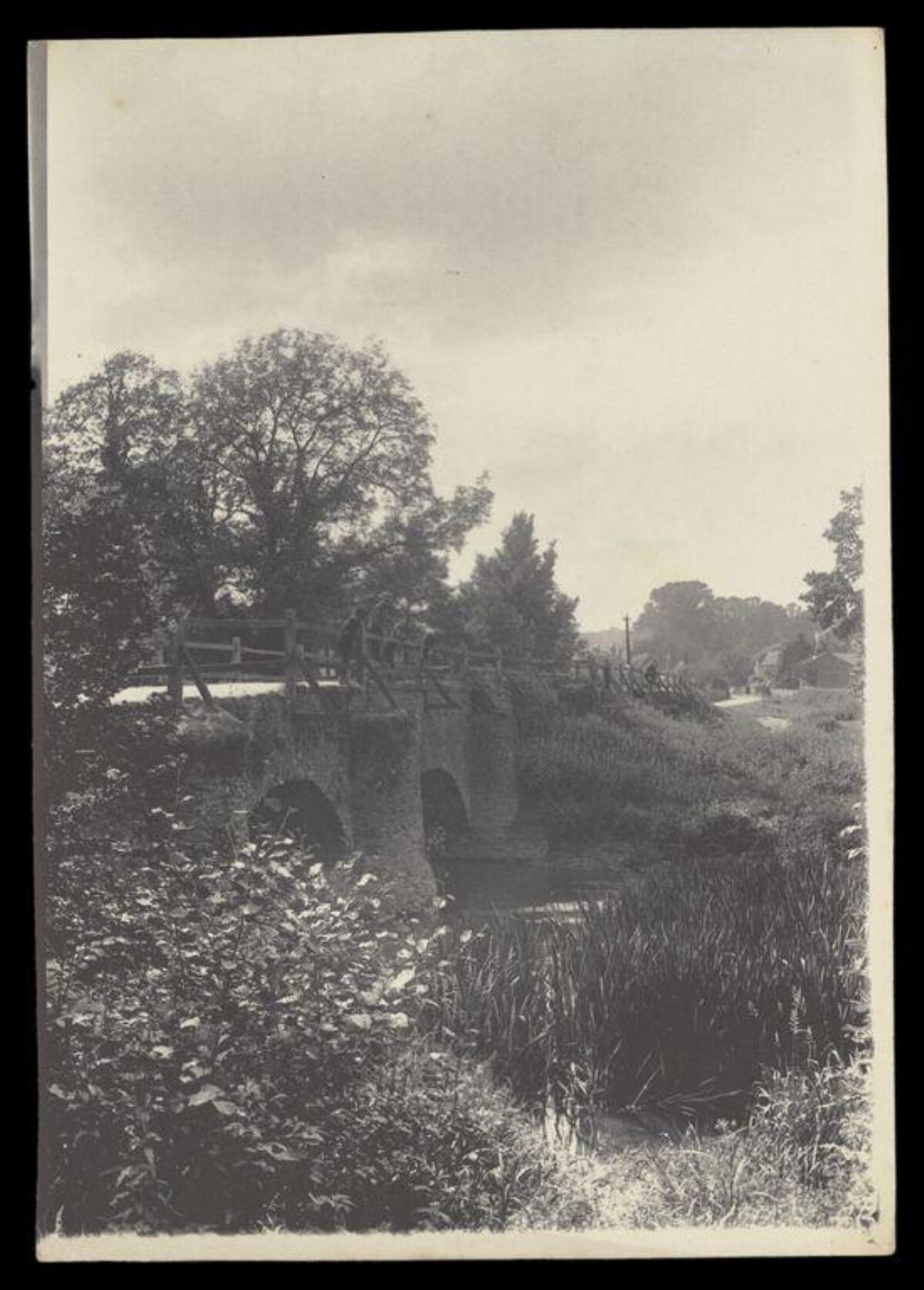 Old Stone Bridge Over Country Stream