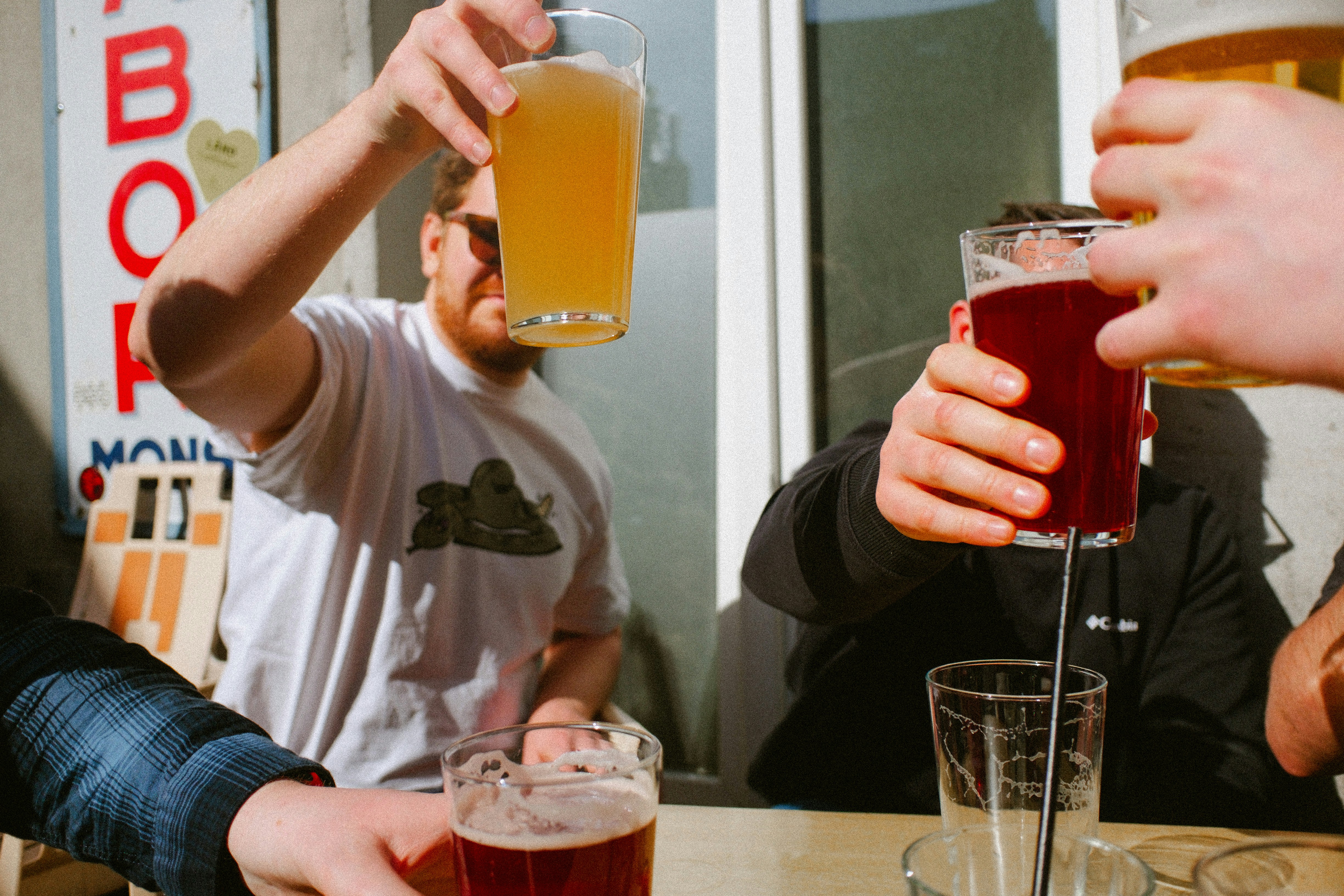 Friends Toasting Beer Outdoors