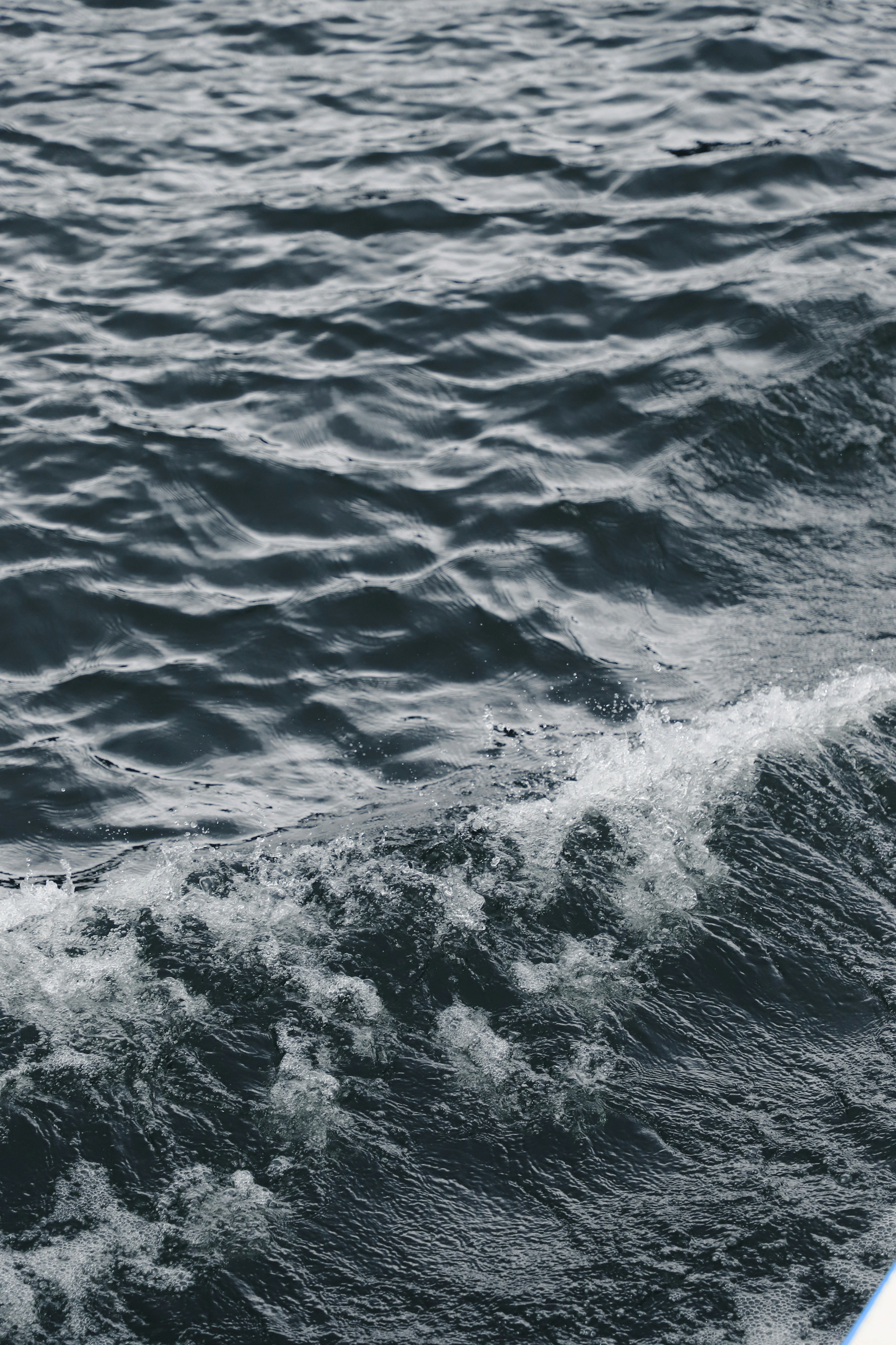 Dark Rippled Sea with White Surf