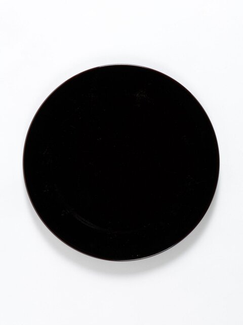 Black Round Plate on White Background