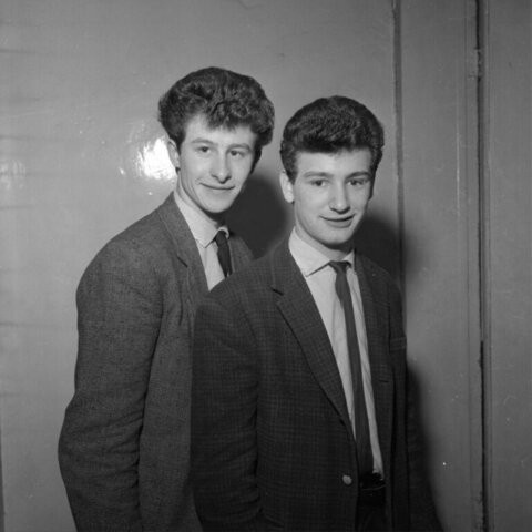Two Young Men In Vintage Suits Posing
