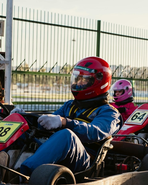 Two go-kart drivers at starting line