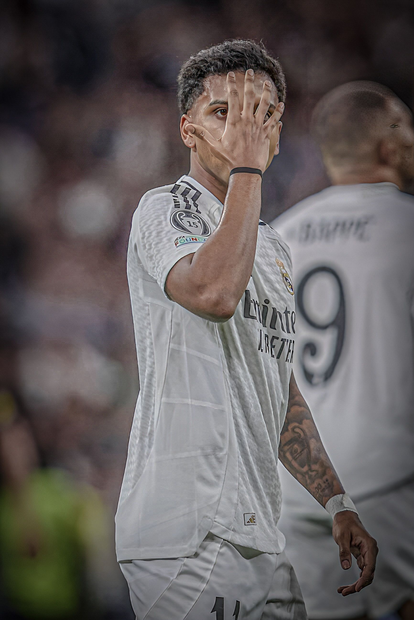 Real Madrid Player Rodrygo Covers Face