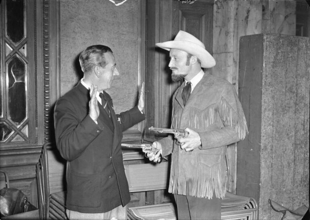 Cowboy Holds Guns On Surrendering Man
