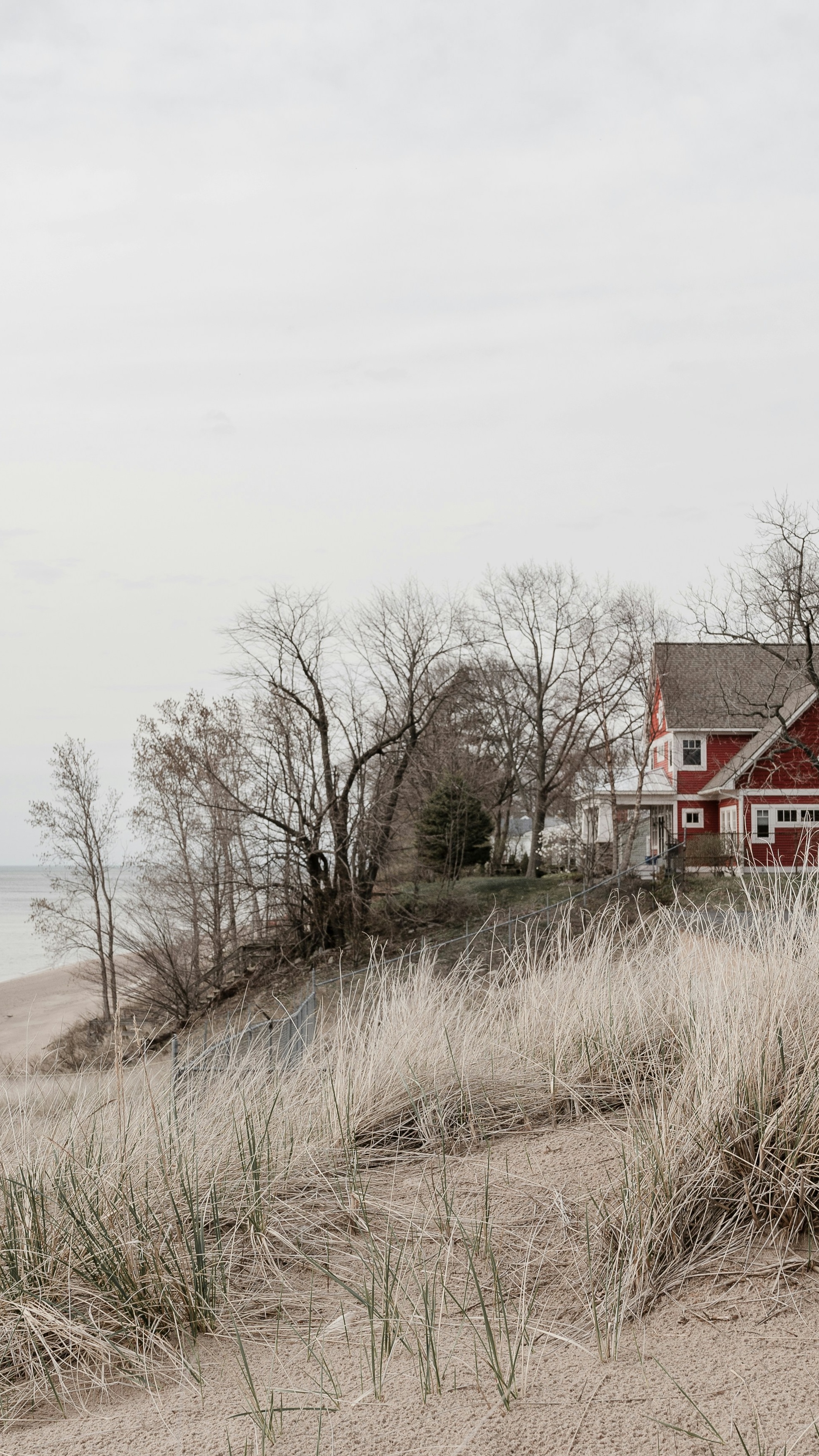 Red Lakefront House on Sand Dune