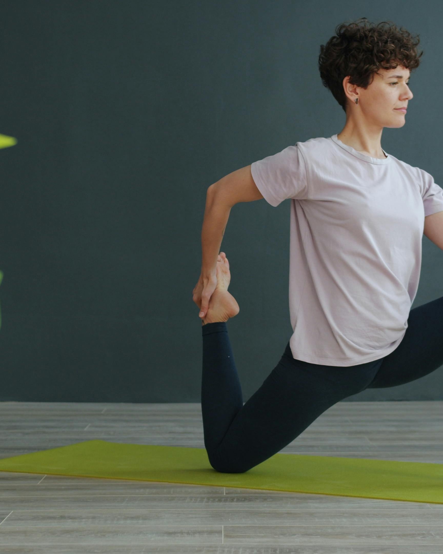 Woman Practicing Yoga Pose