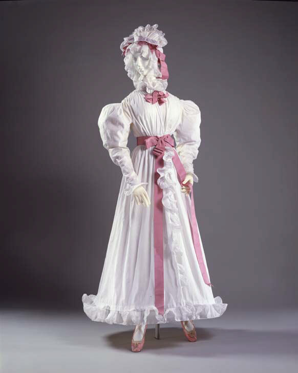 Vintage White Dress on Display Mannequin