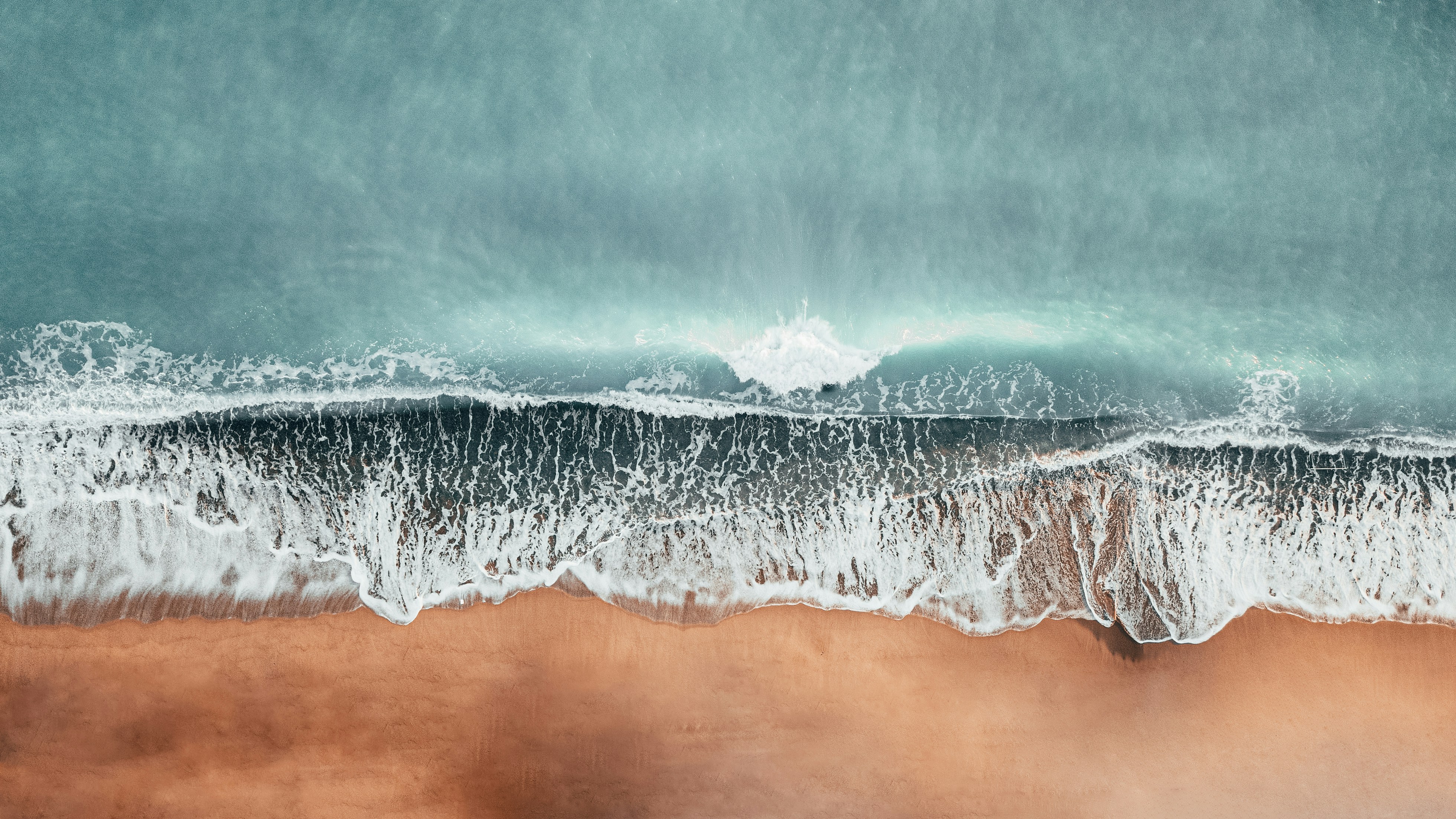 Aerial View of Beach Waves