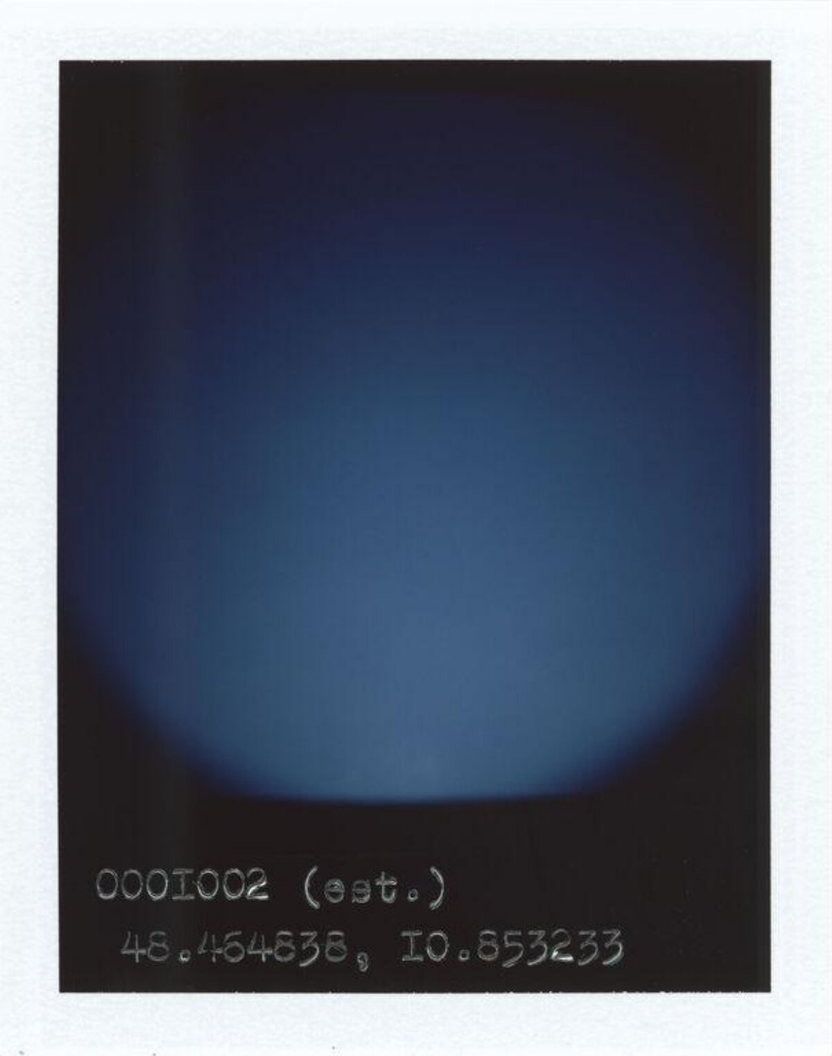 Polaroid with Handwritten Coordinates