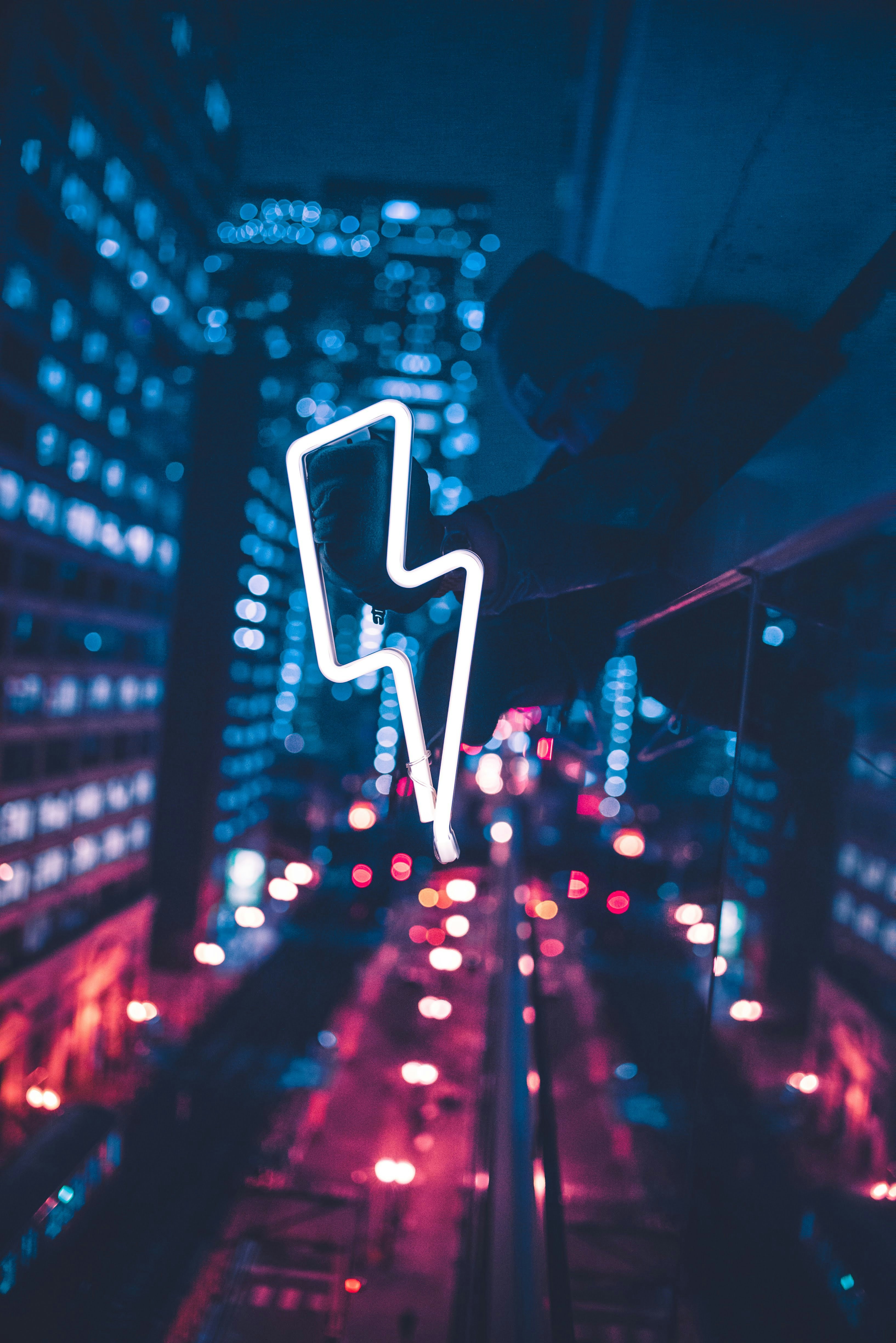 City Night with Neon Lightning Sign