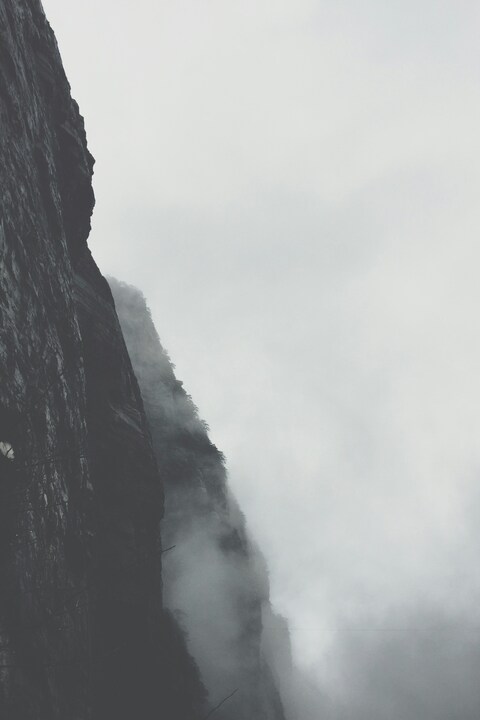 Foggy Steep Mountain Cliffs