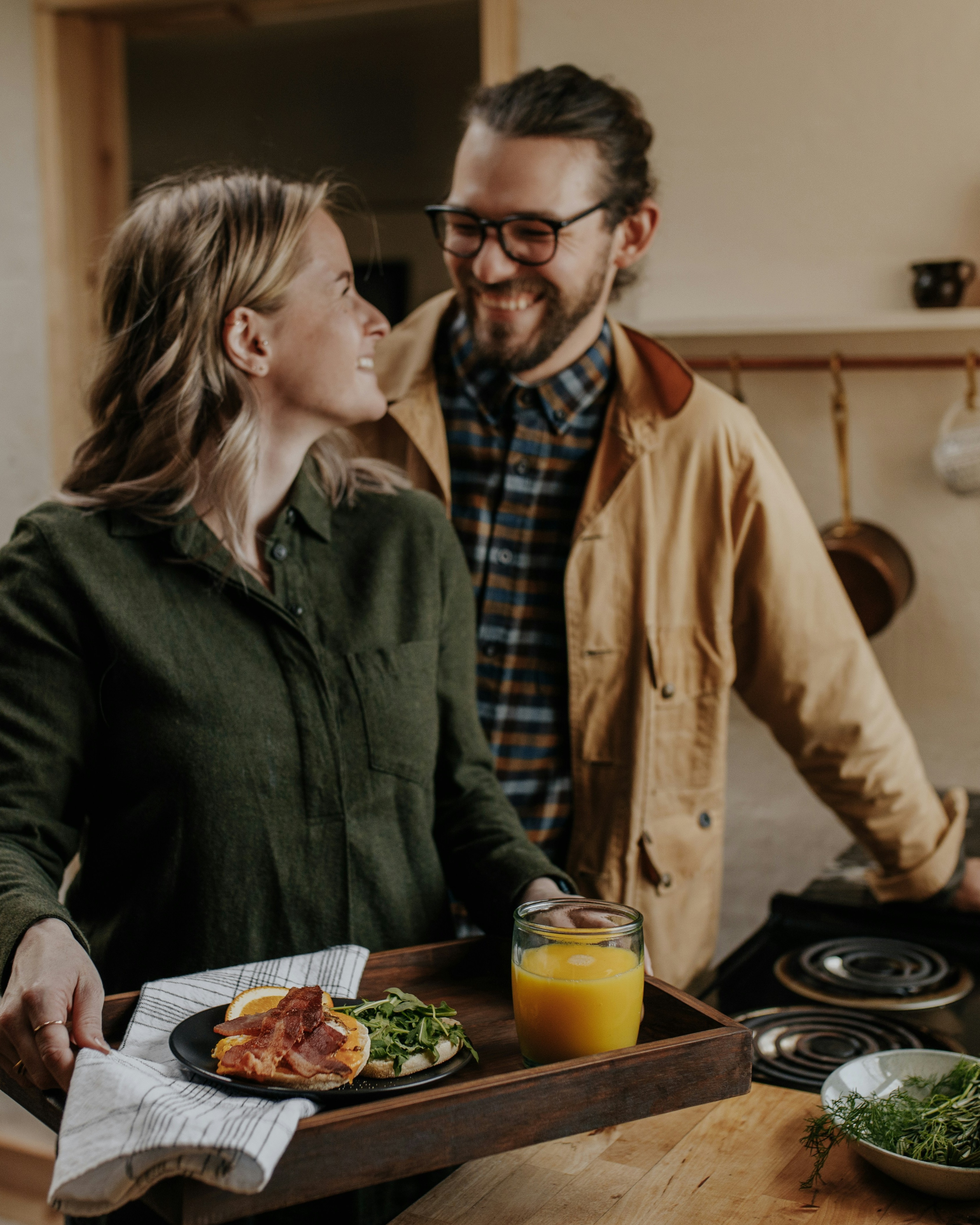 Couple Preparing Breakfast in Kitchen