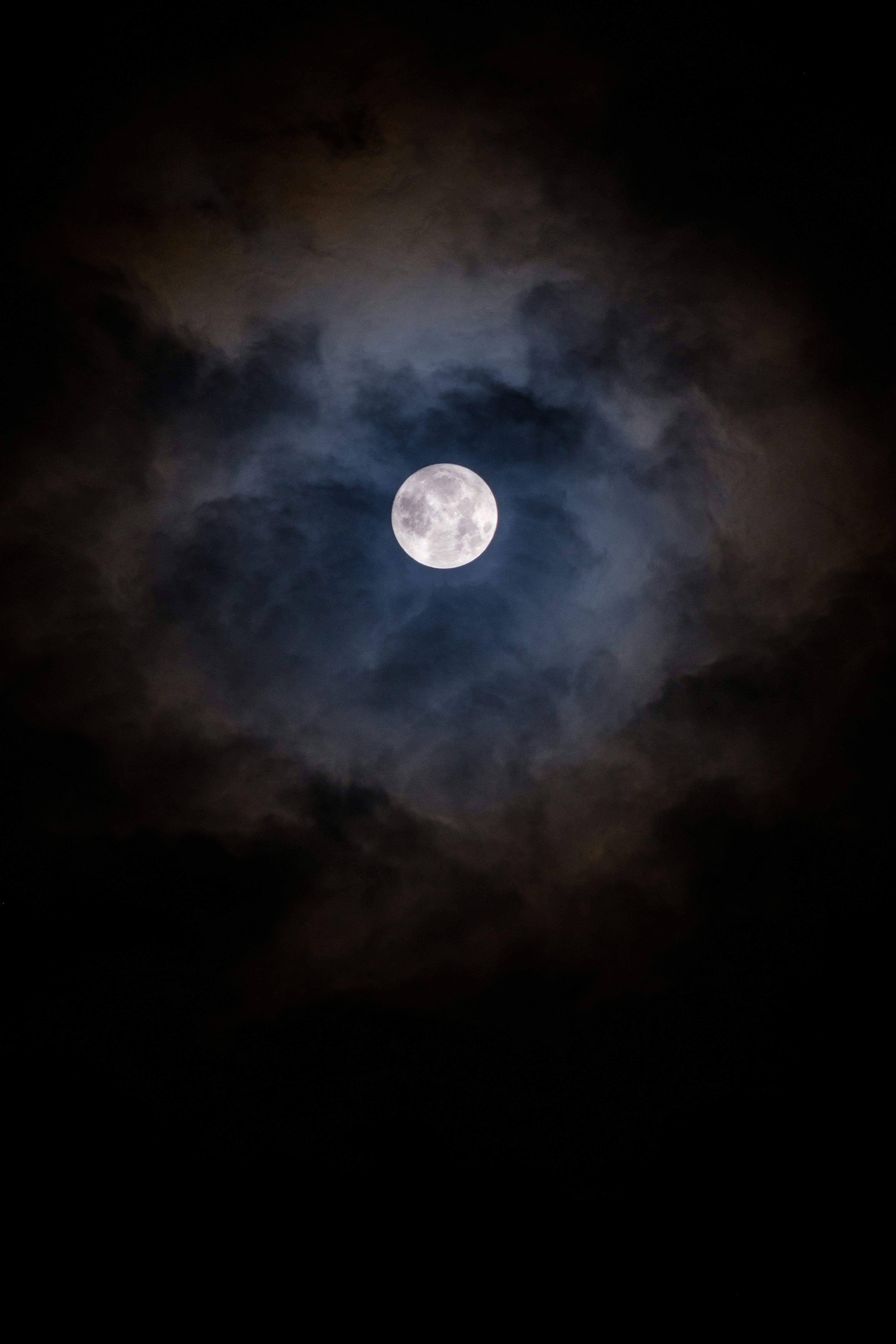 Full Moon Among Night Clouds