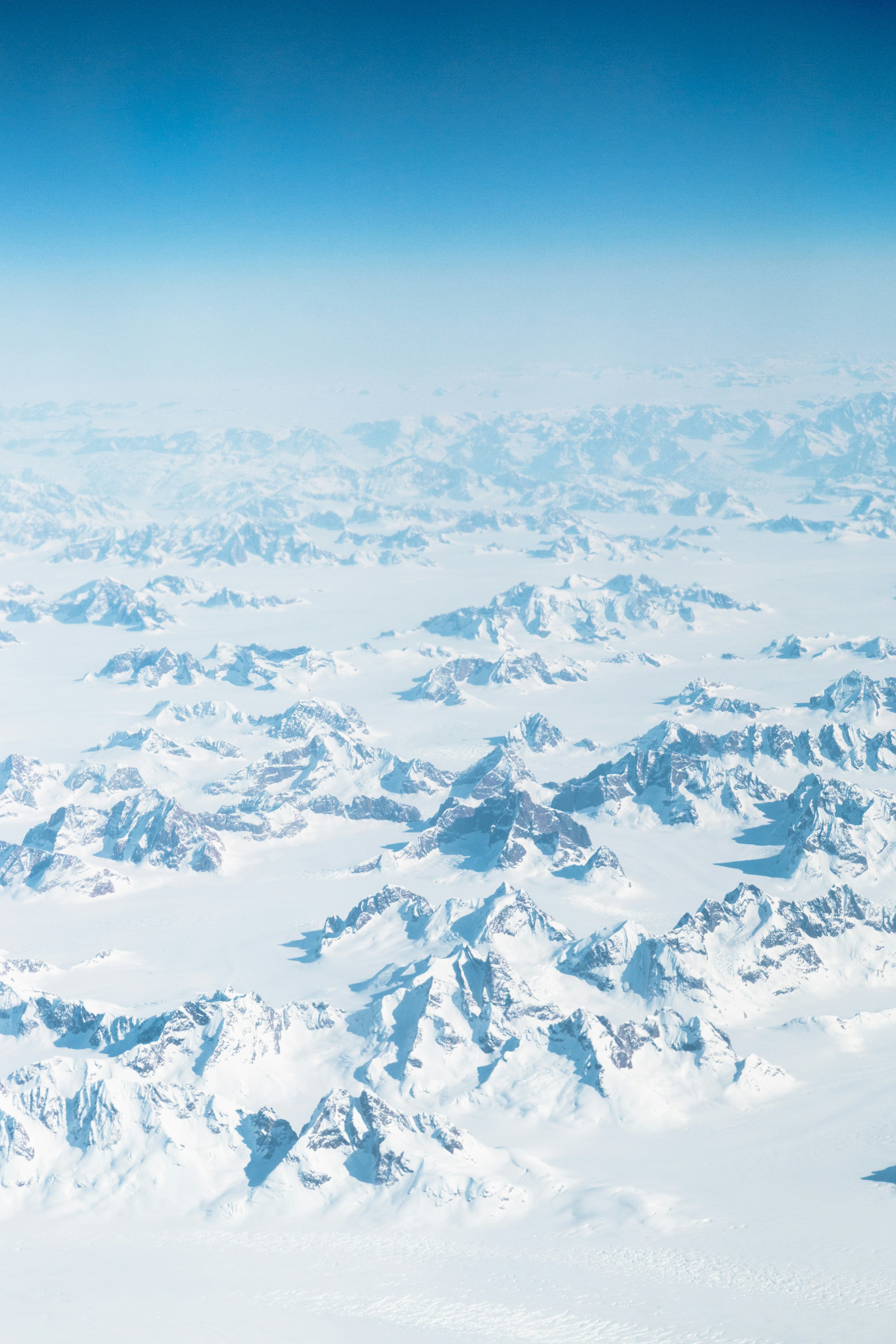Aerial View of Snow-covered Mountains