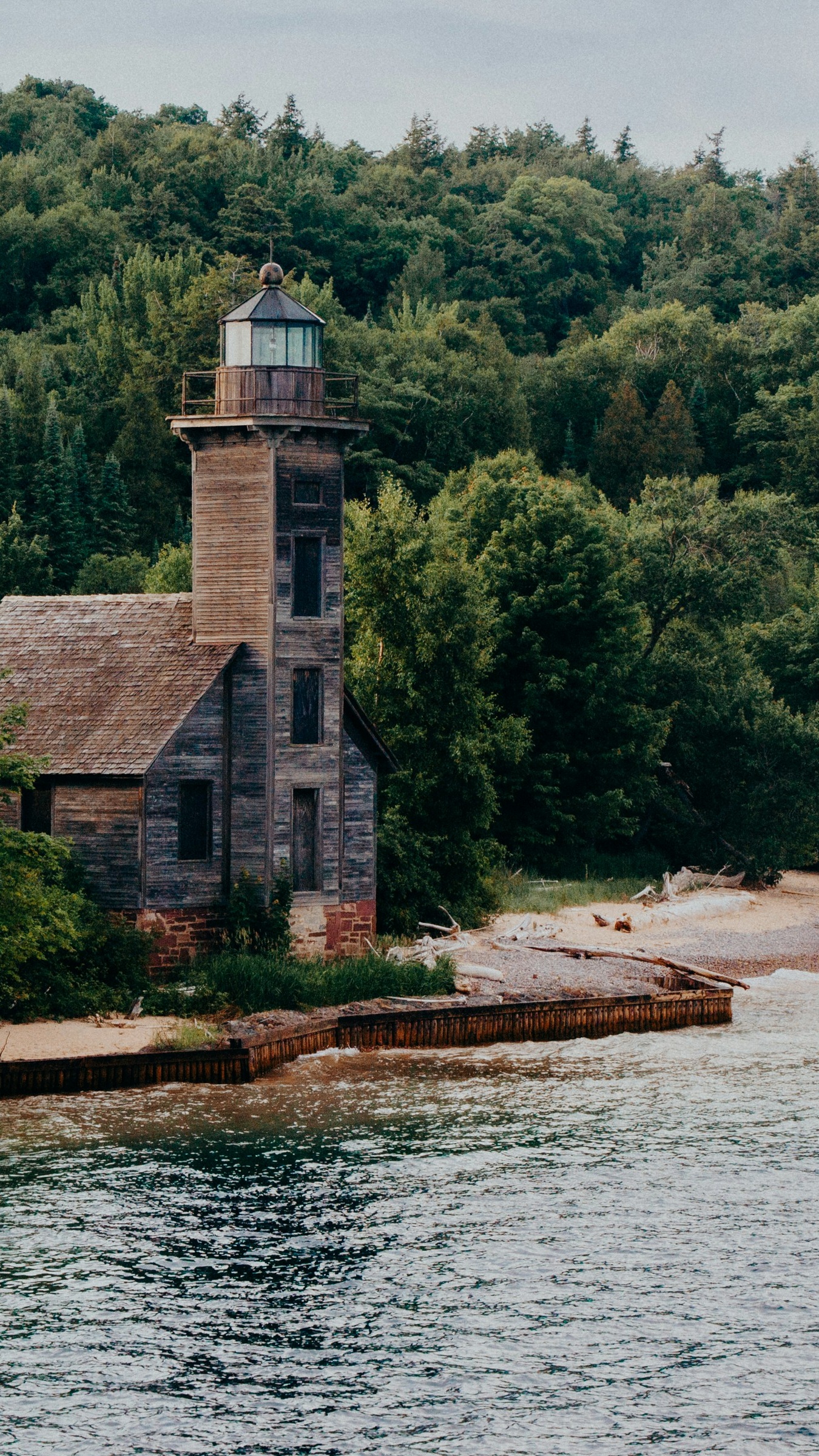 Abandoned Wooden Lighthouse on Shore