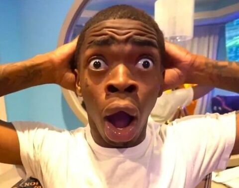 Shocked Man With Hands On Head