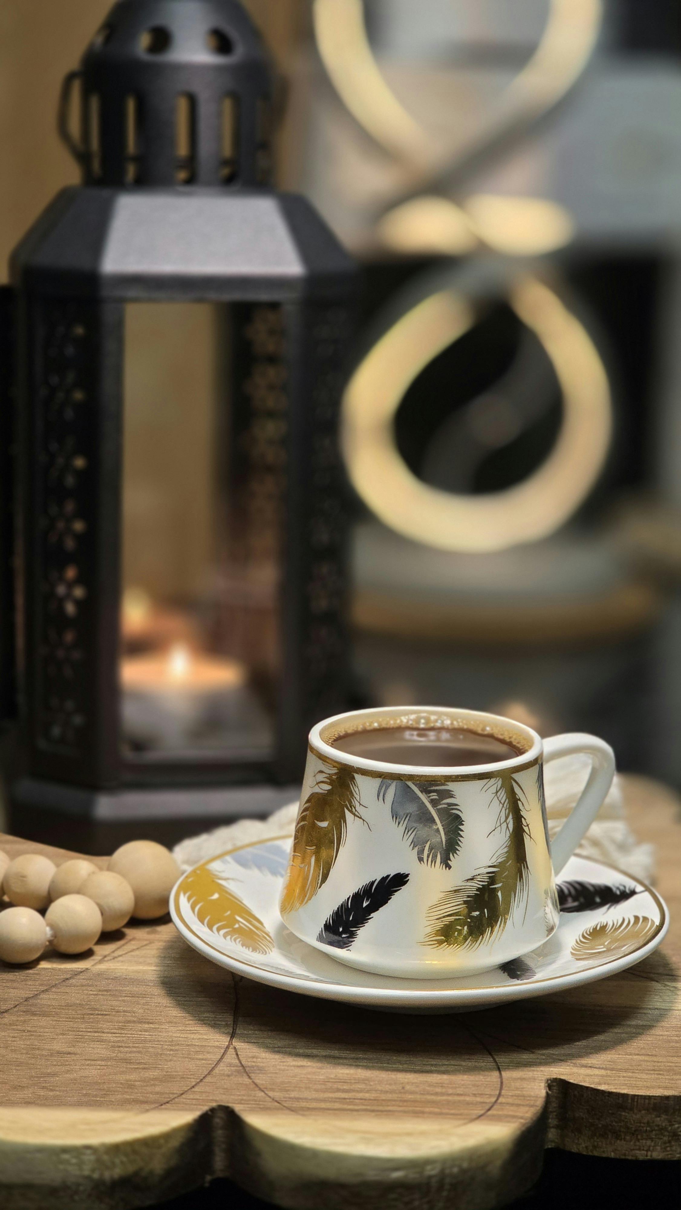 Feather Print Coffee Cup with Coffee