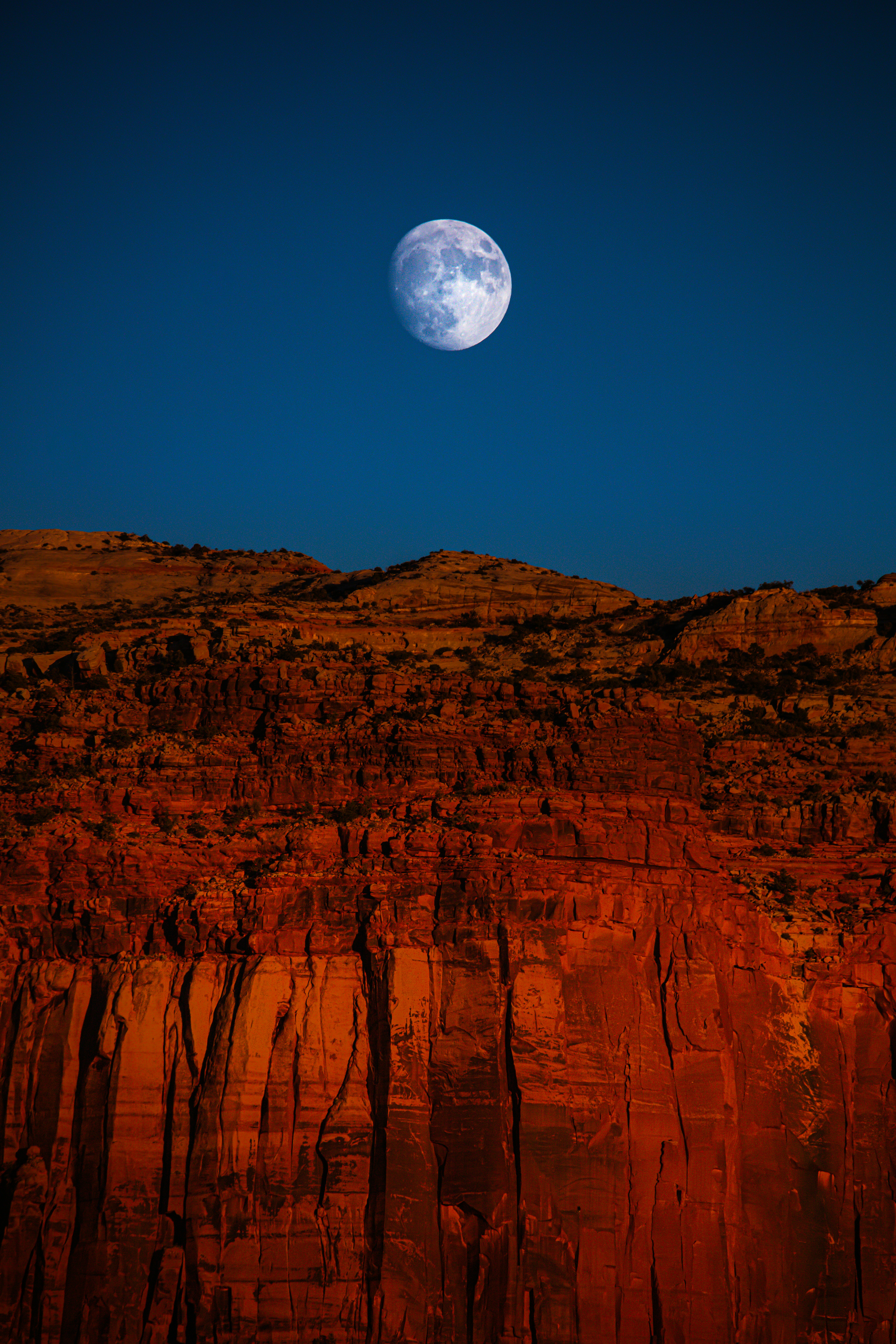 Full Moon Over Red Canyon Cliffs