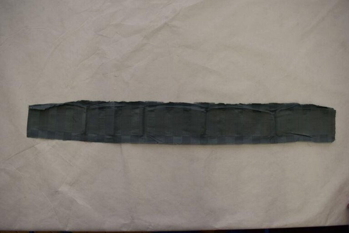 Dark Gray Duct Tape on Off-White Background