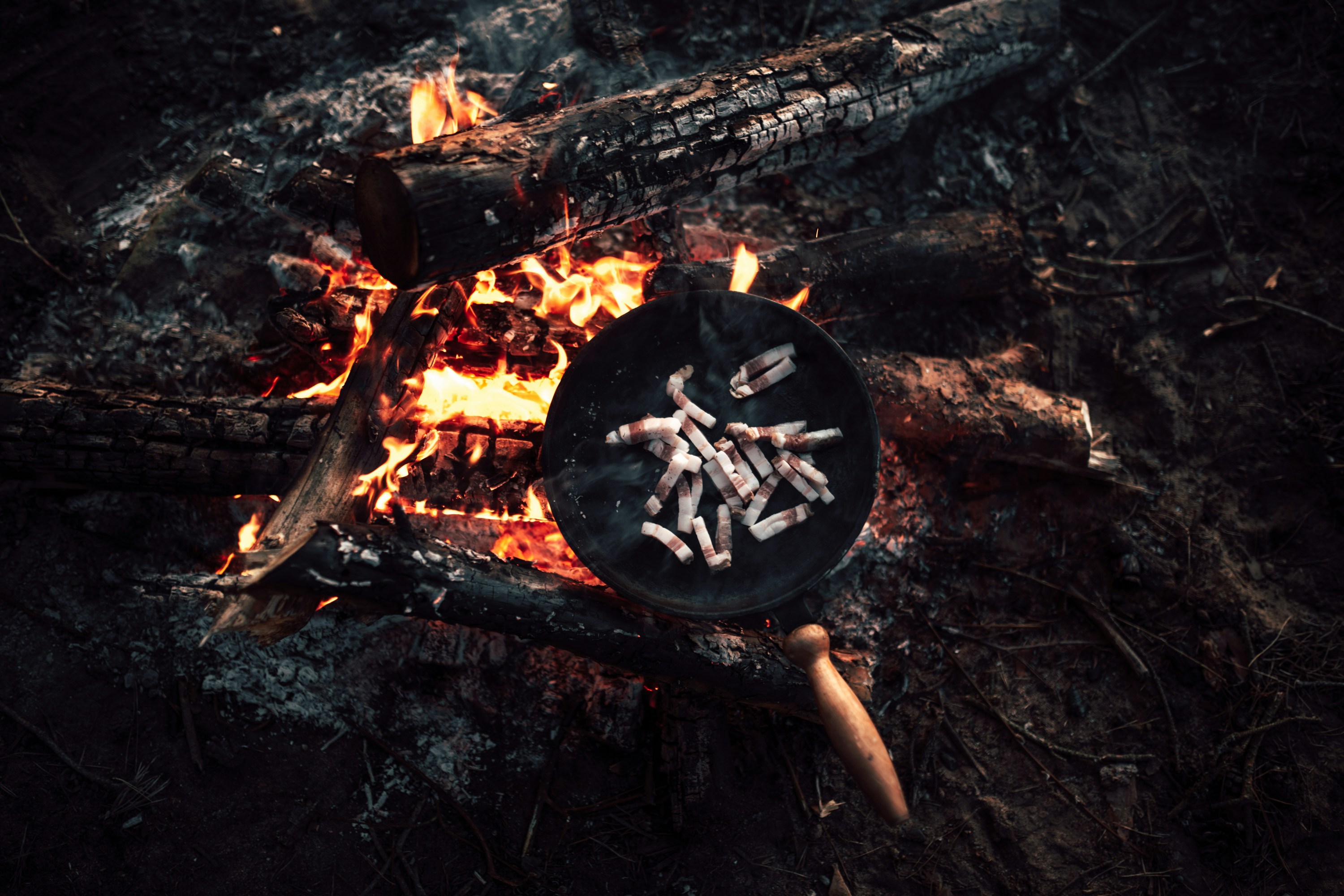 Frying Bacon Over Campfire