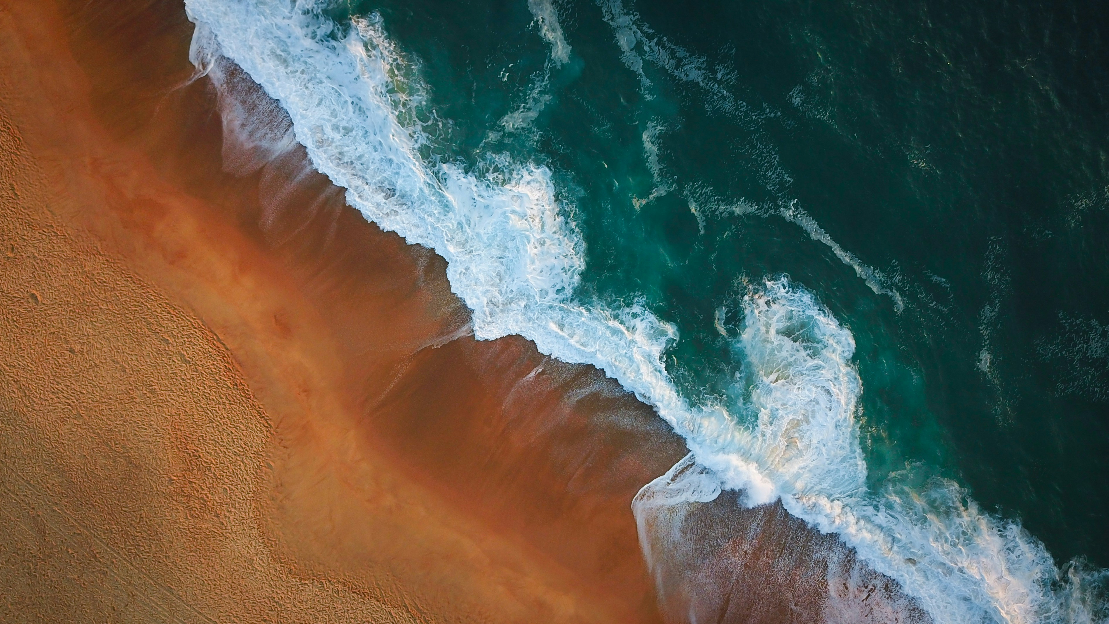 Aerial View of Beach Waves