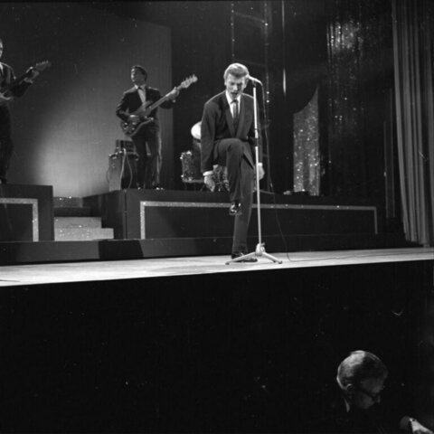 Lead Singer Performing on Stage