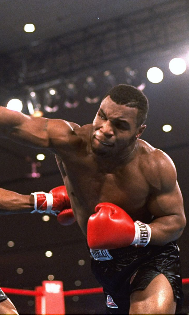 Mike Tyson Throwing Punch In Boxing Match