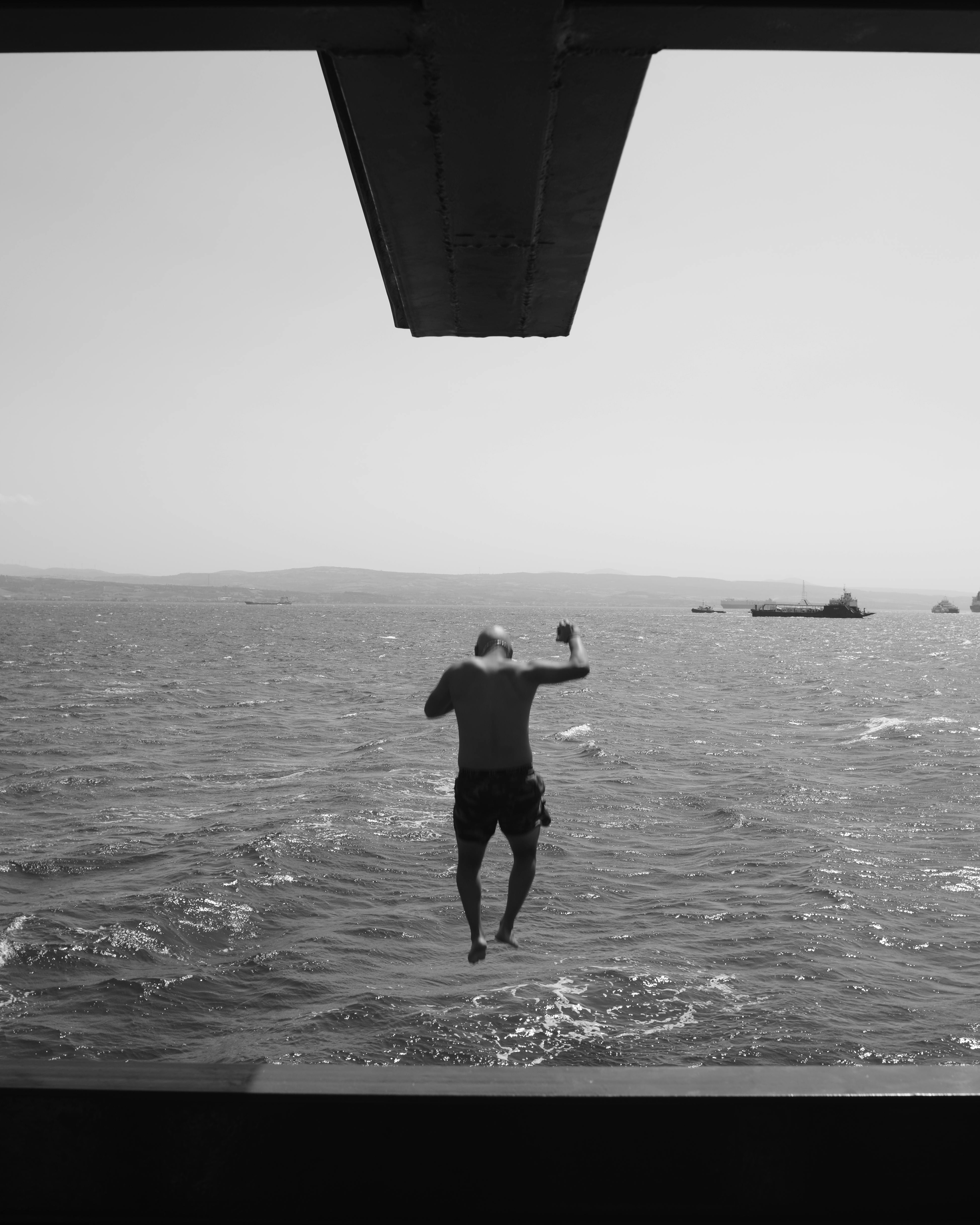 Man Jumping Into Open Sea