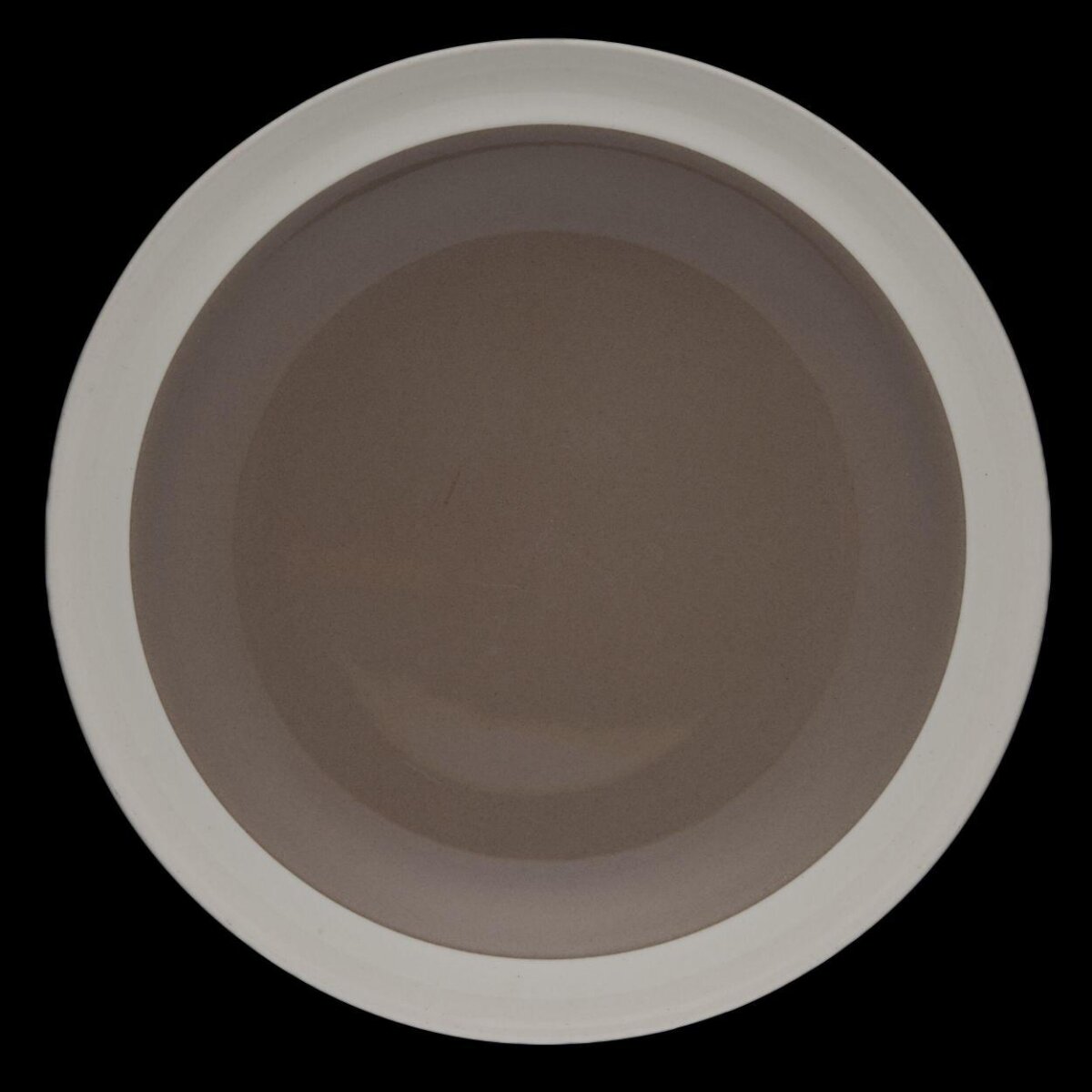 Empty Round Plate On Black Background