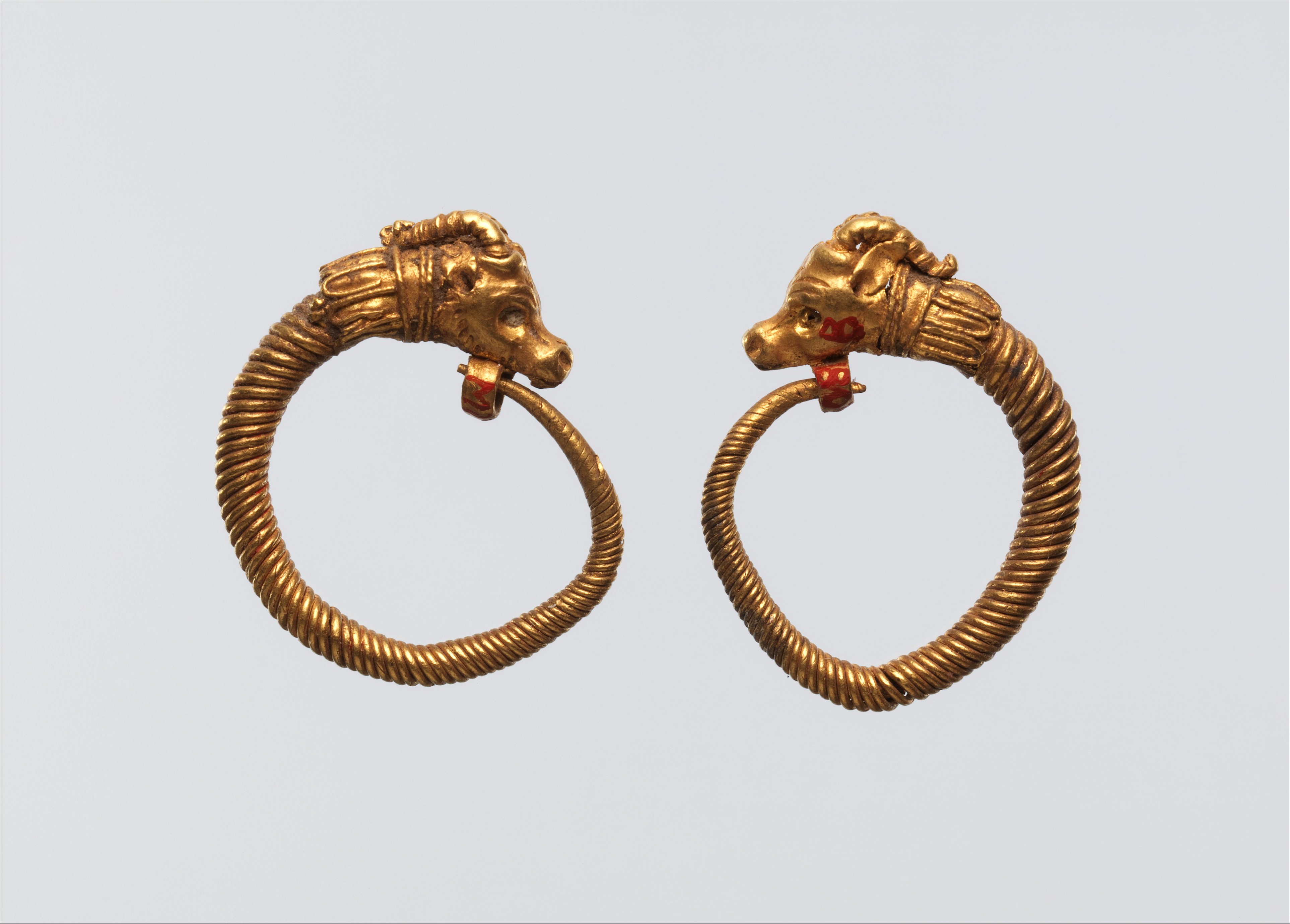 Pair of Golden Ram Head Earrings