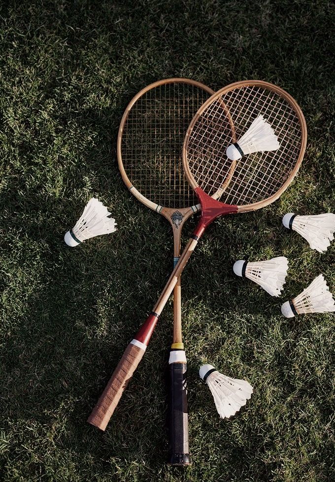 Vintage Badminton Gear on Green Grass