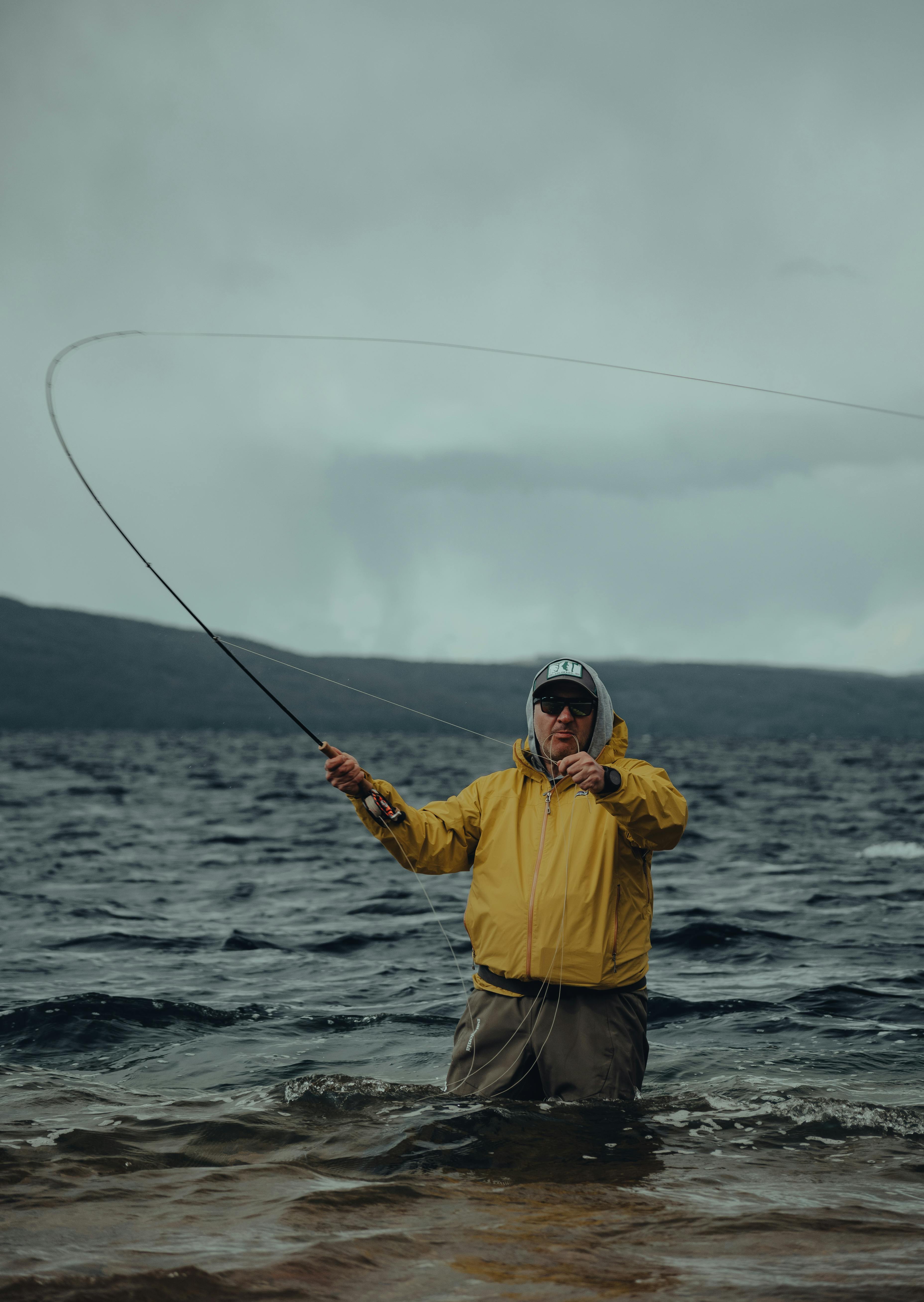 Fly Fisherman Casting in Open Water