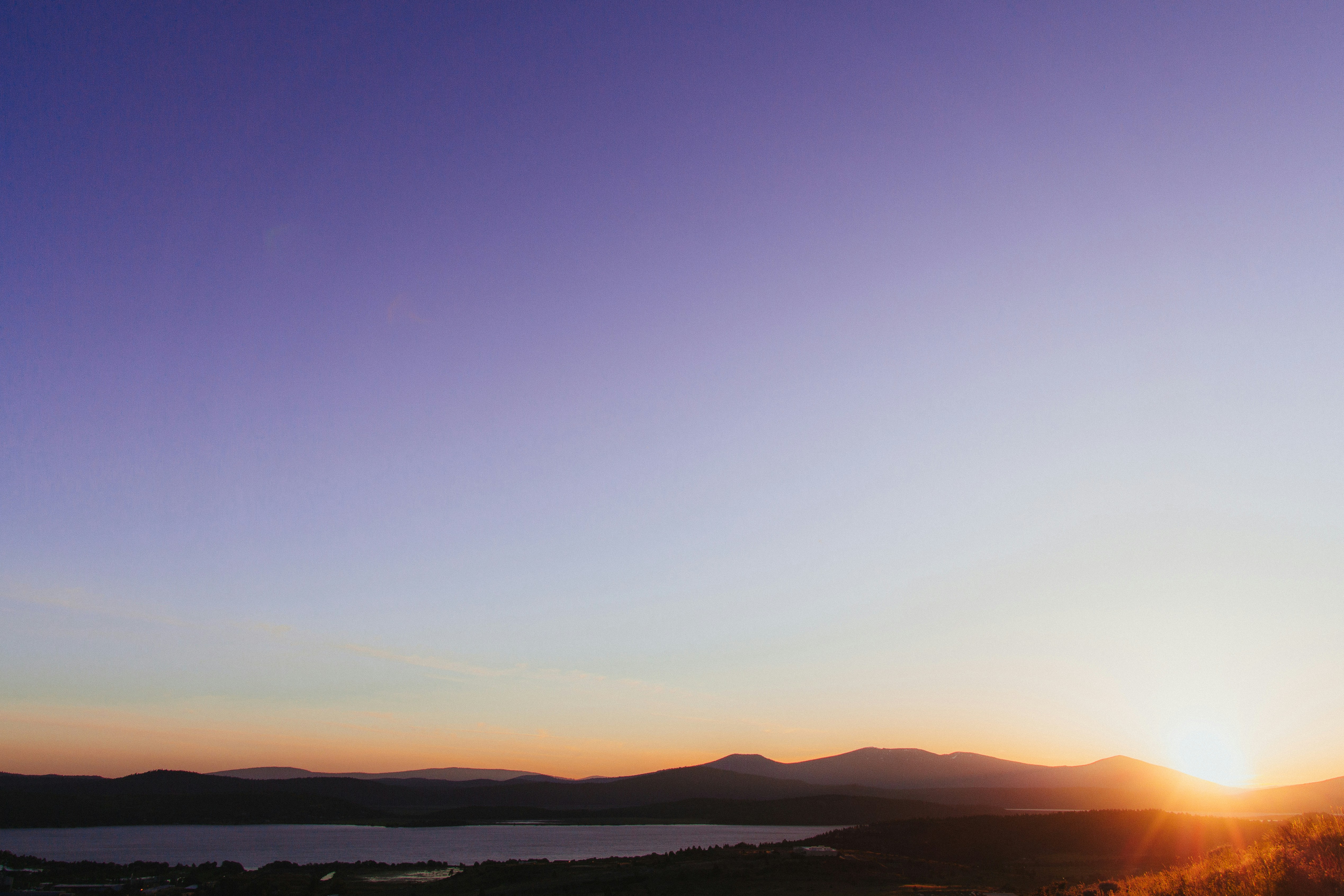 Sunset Over Mountain Lake