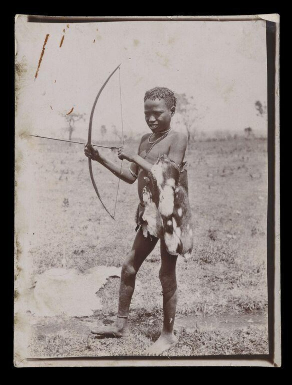 Indigenous Boy With Bow and Arrow
