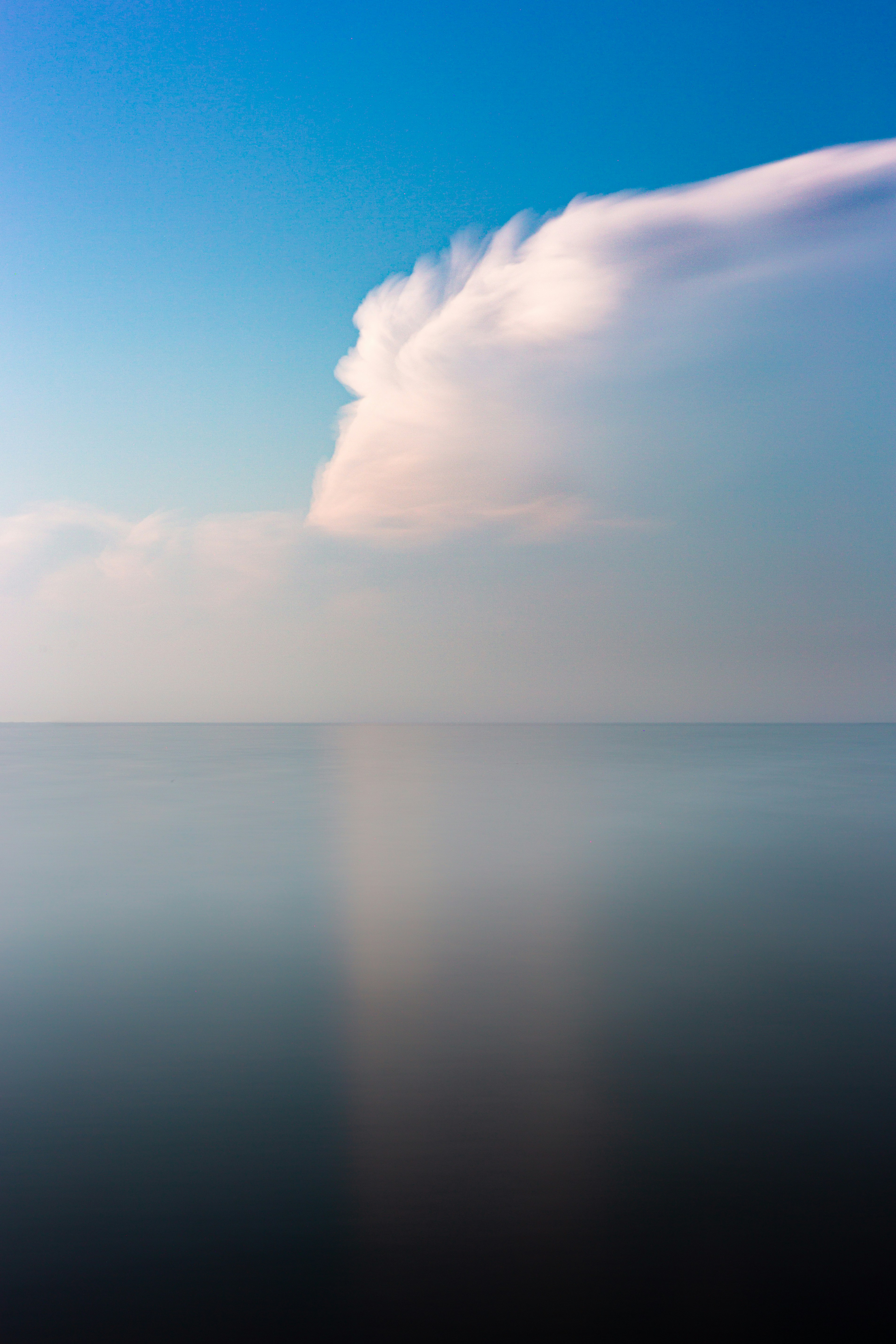 Large Cloud Over Calm Water