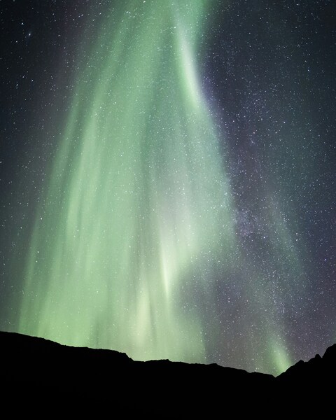 Northern Lights Over Mountains