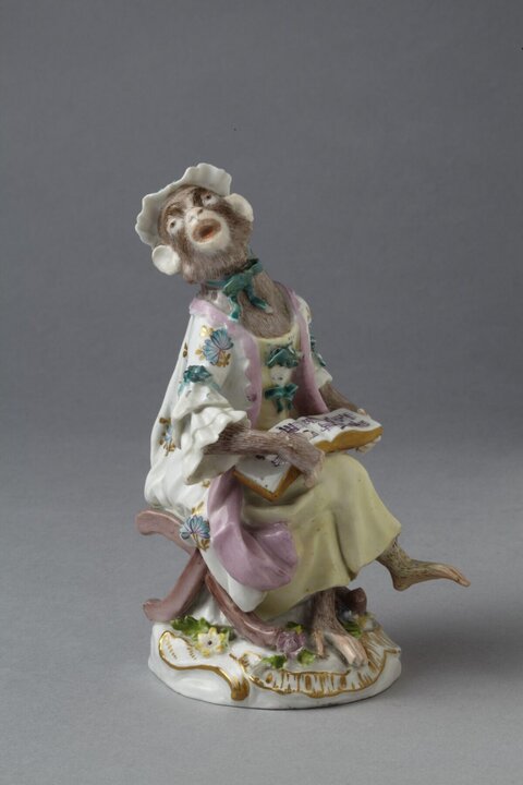 Porcelain Singing Monkey Figurine