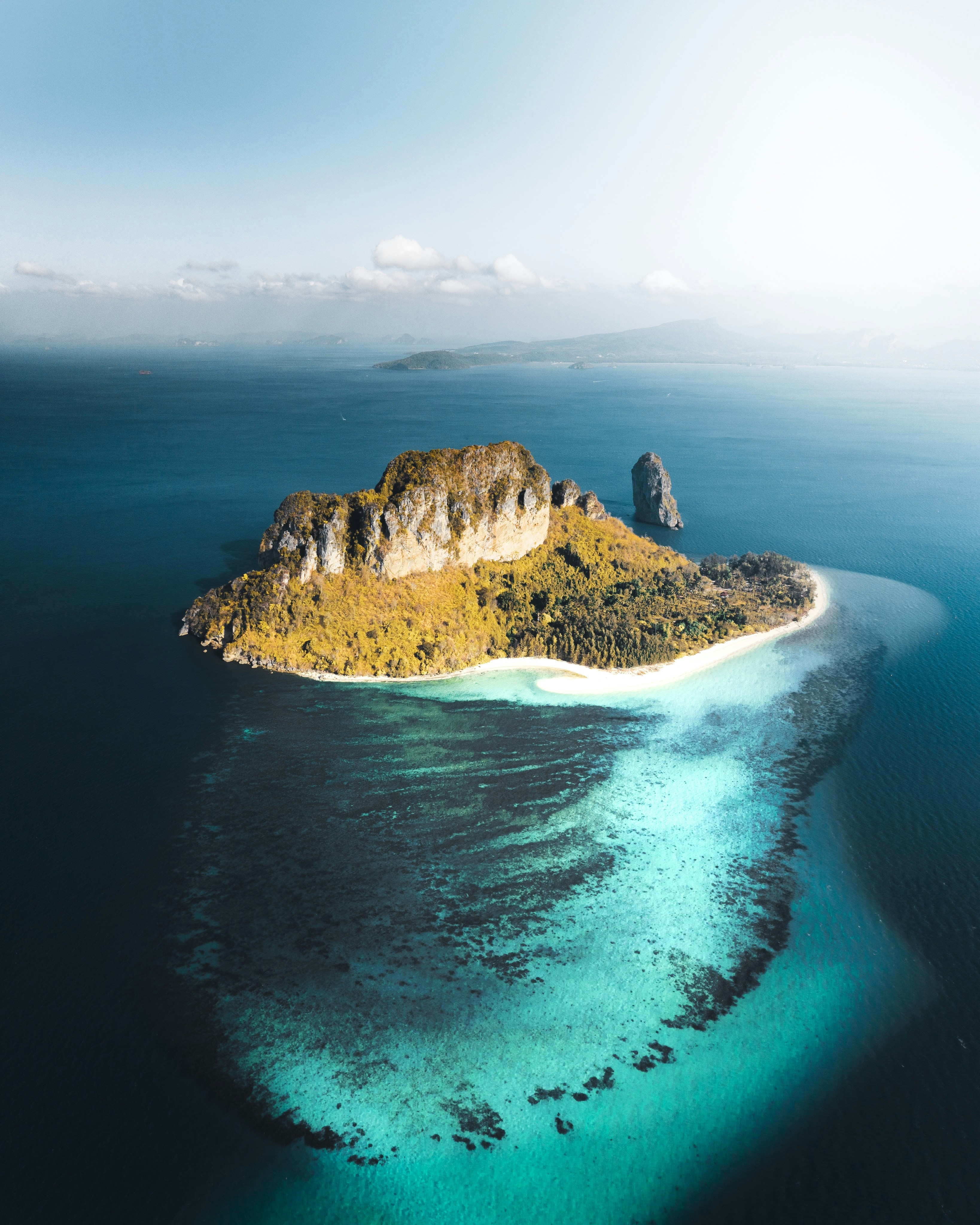 Lone Tropical Island in Blue Sea