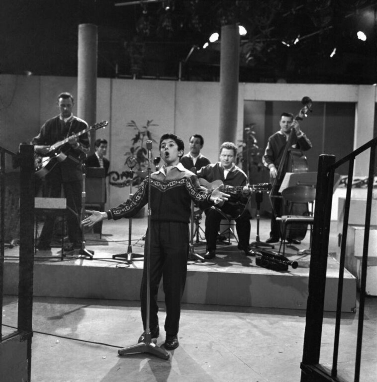 Young Singer Performing with Band