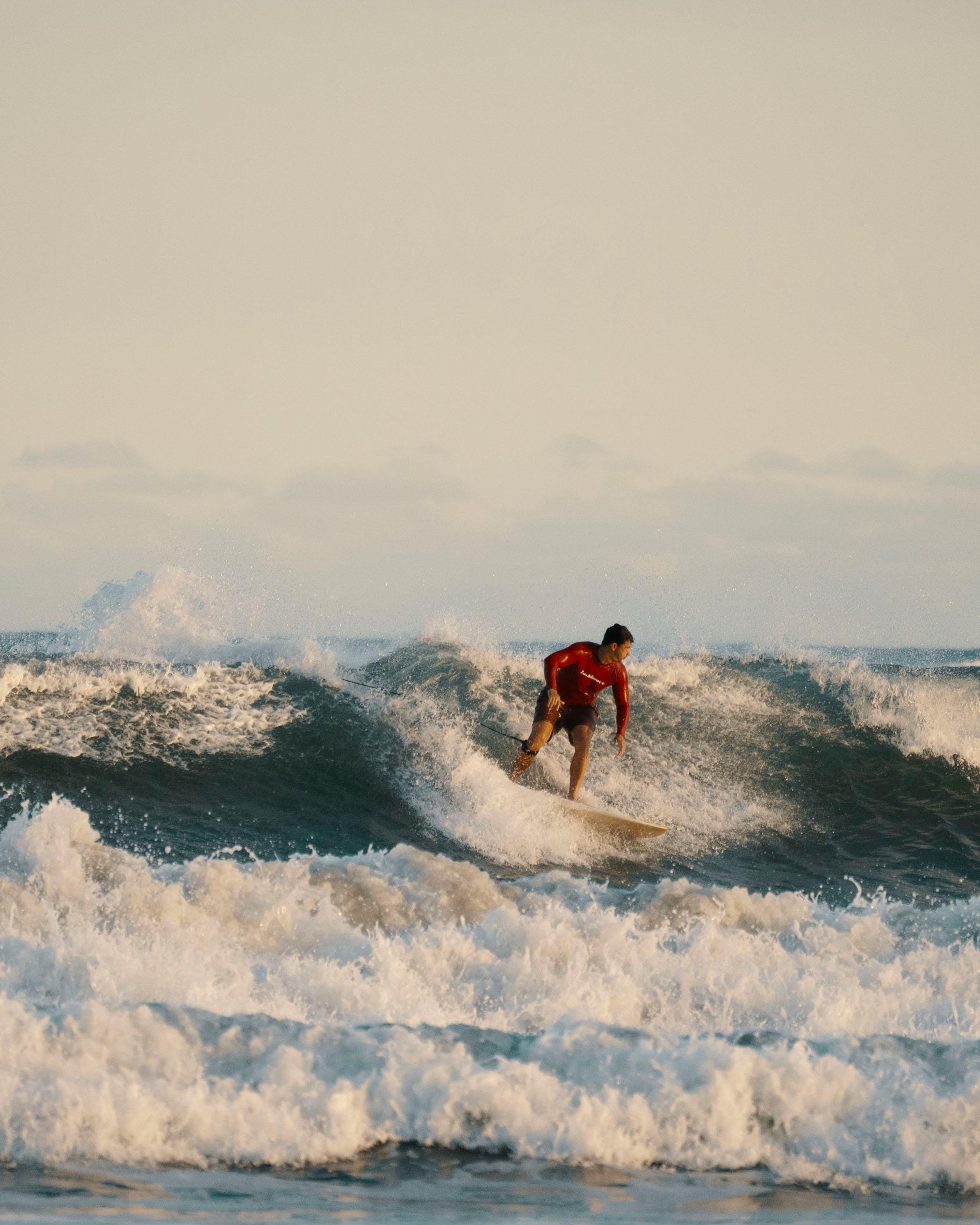 Surfer Riding an Ocean Wave